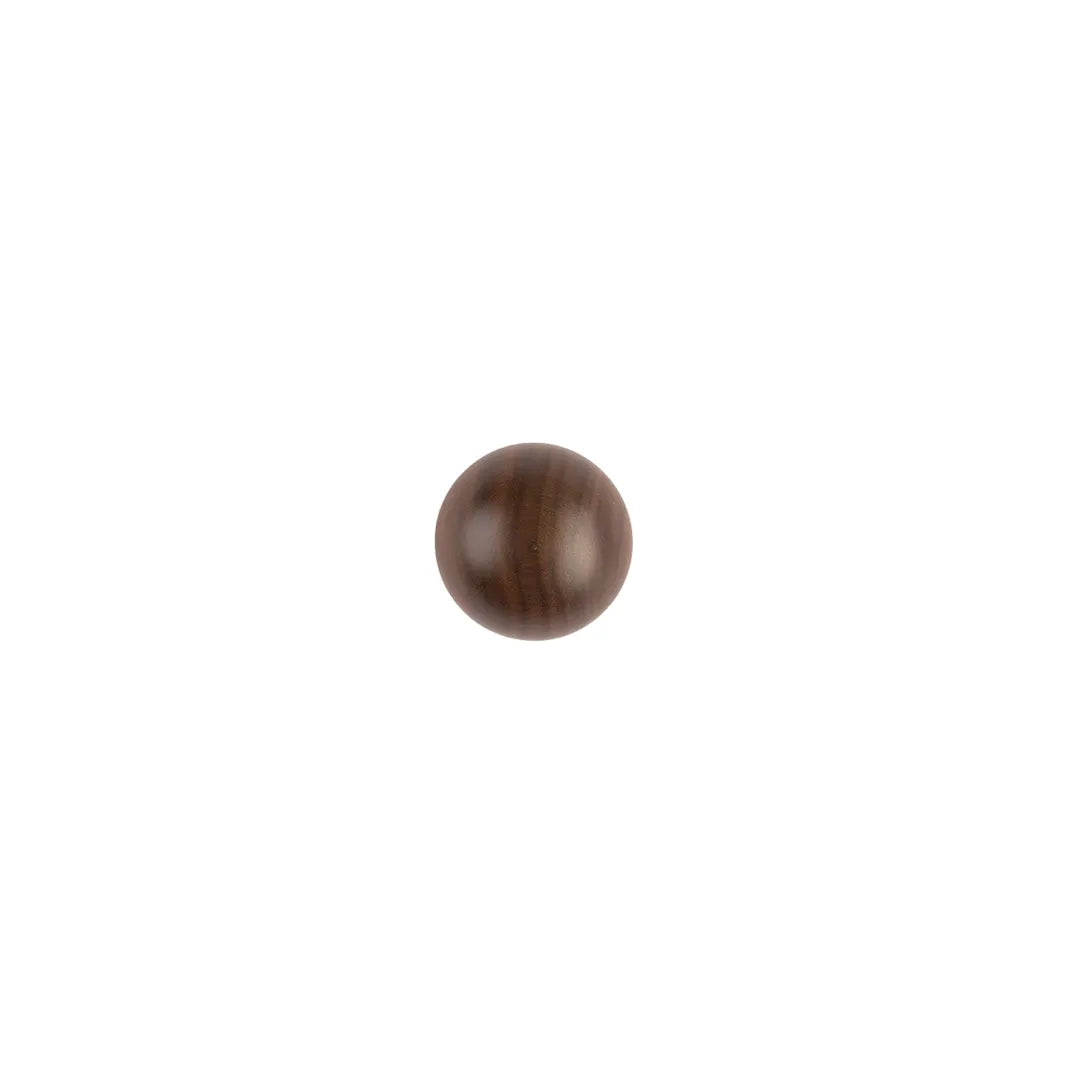 A single round wooden knob or ball finial in a medium-to-dark brown wood finish, centered on a solid white background.