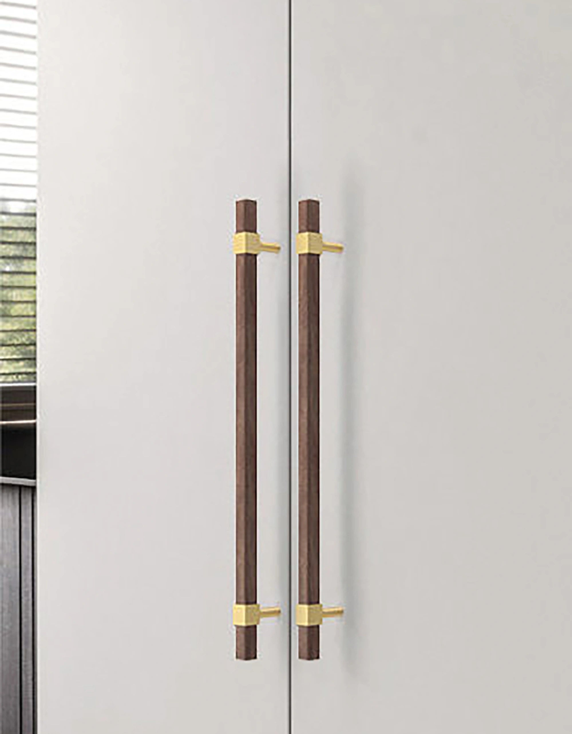 Ebonex Handle W-0009 in brushed brass & walnut, sizes 70–391mm, suits doors, cabinets & wardrobes—by Mantara.