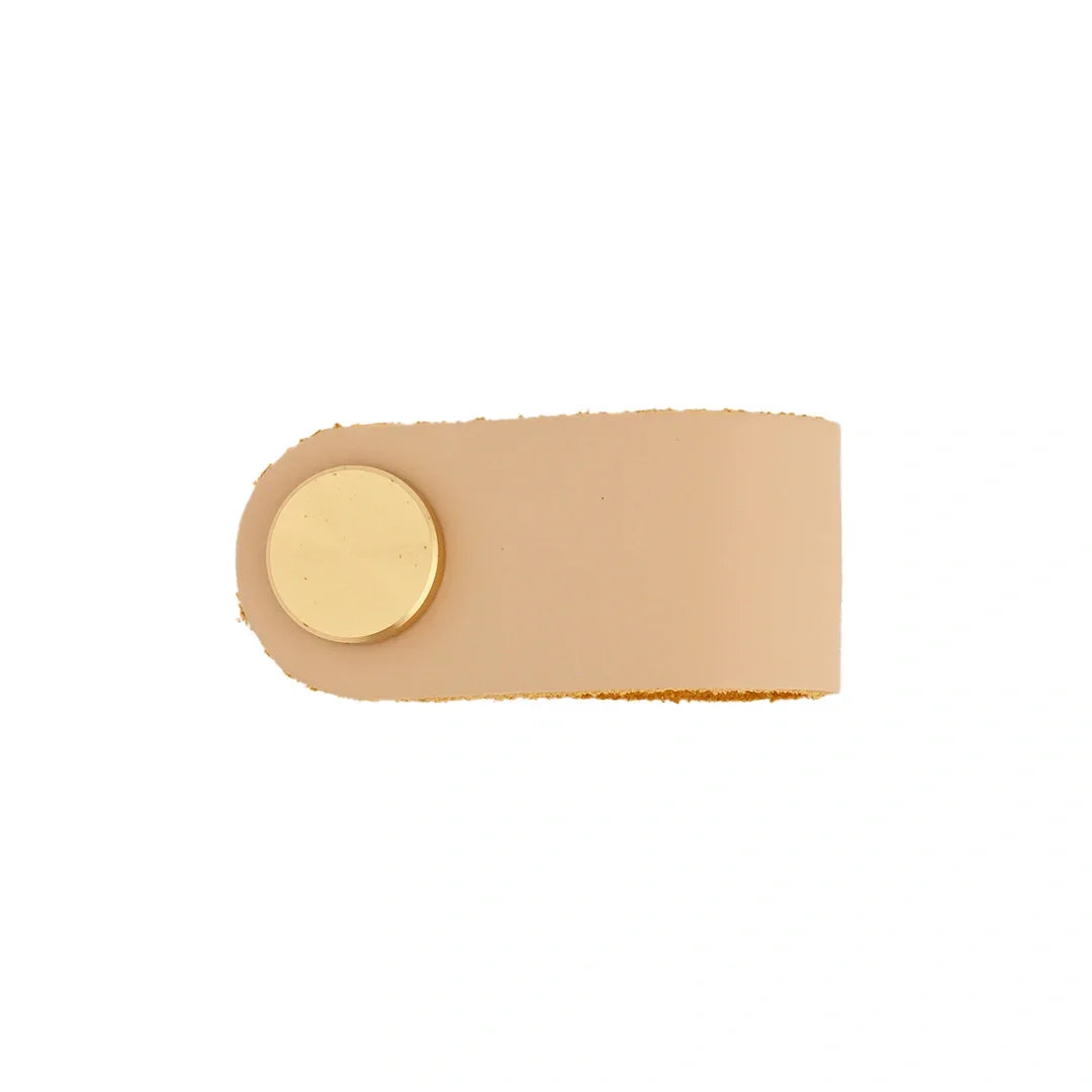 The Mantara L-0001 Maverick Pull Knob is a Nordic leather and brass knob in cream ideal for kitchens and furniture.