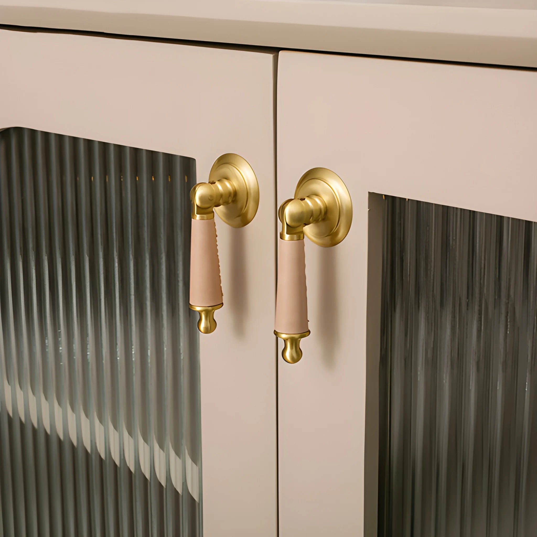 Leather and brass drop knob in brown finish by Mantara, model Austere Drop Knob with L-0009.