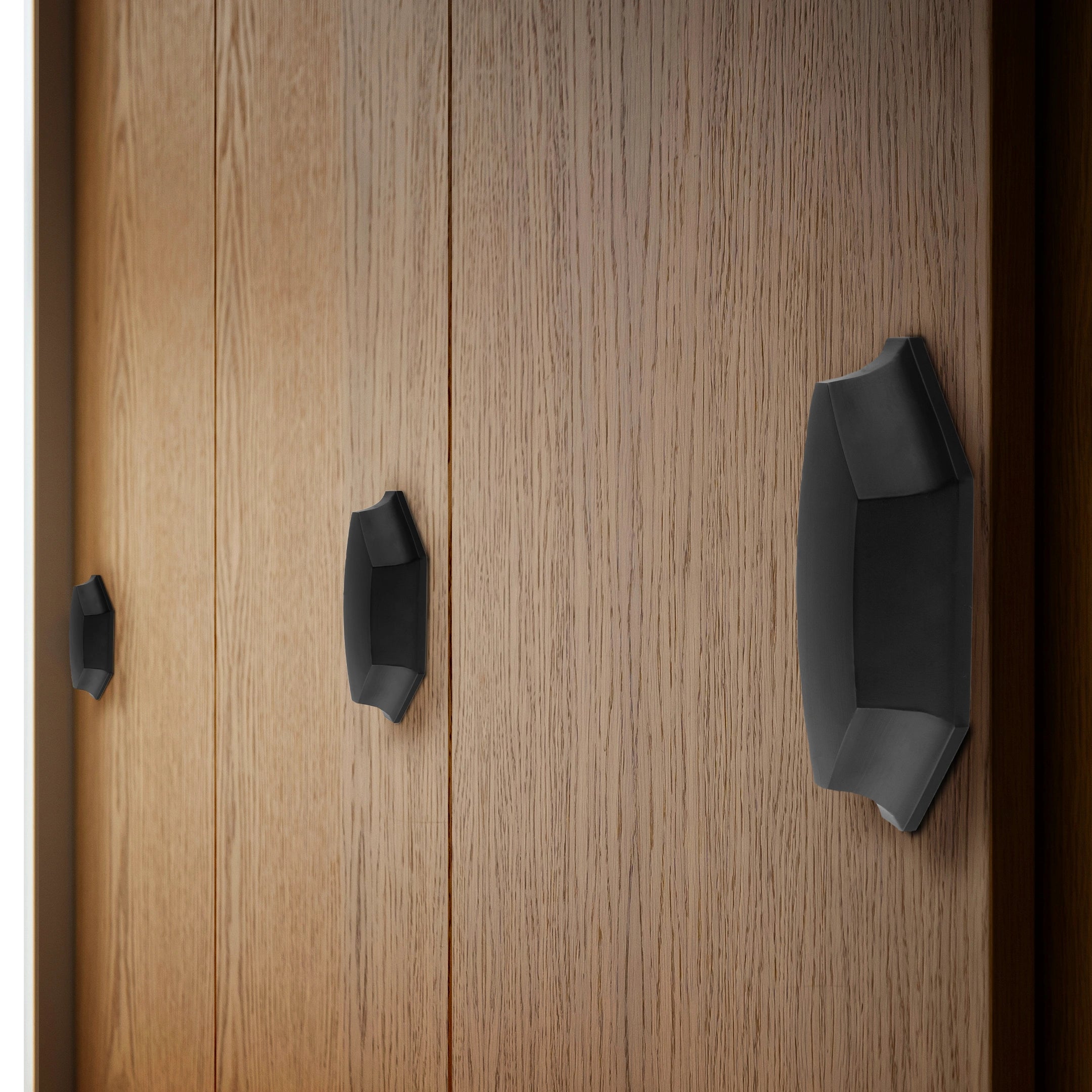 Mantara Hexa Pull Handle B-0101 is a modern brass handle in brushed black ideal for drawers, cupboards, and cabinets.