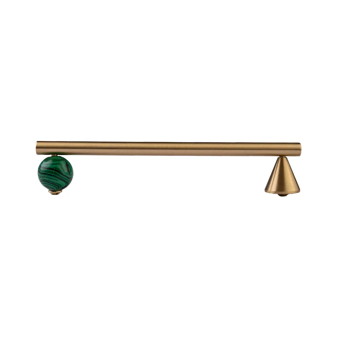 Brass cabinet pull with brushed gold finish and green malachite marble sphere on white background.