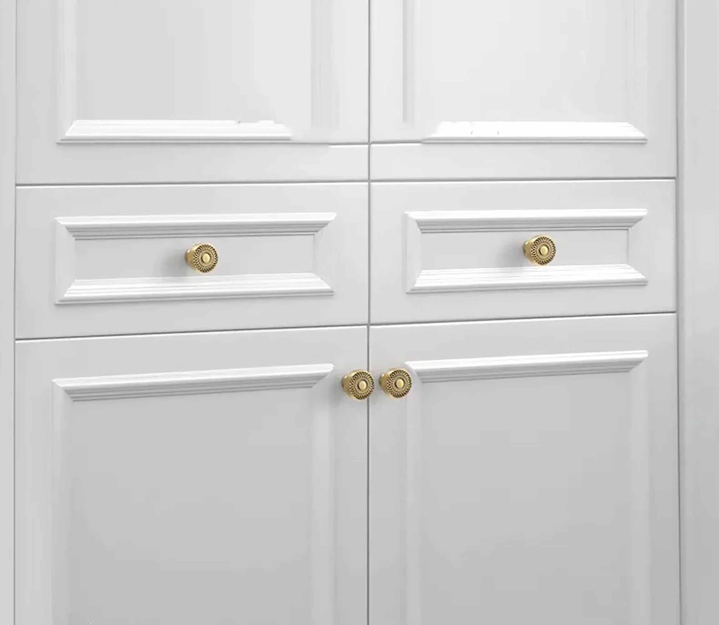 The Mantara B-0032 Karna Knob is a modern polished brass knob in gold, ideal for main doors, kitchens, drawers, and wardrobes.