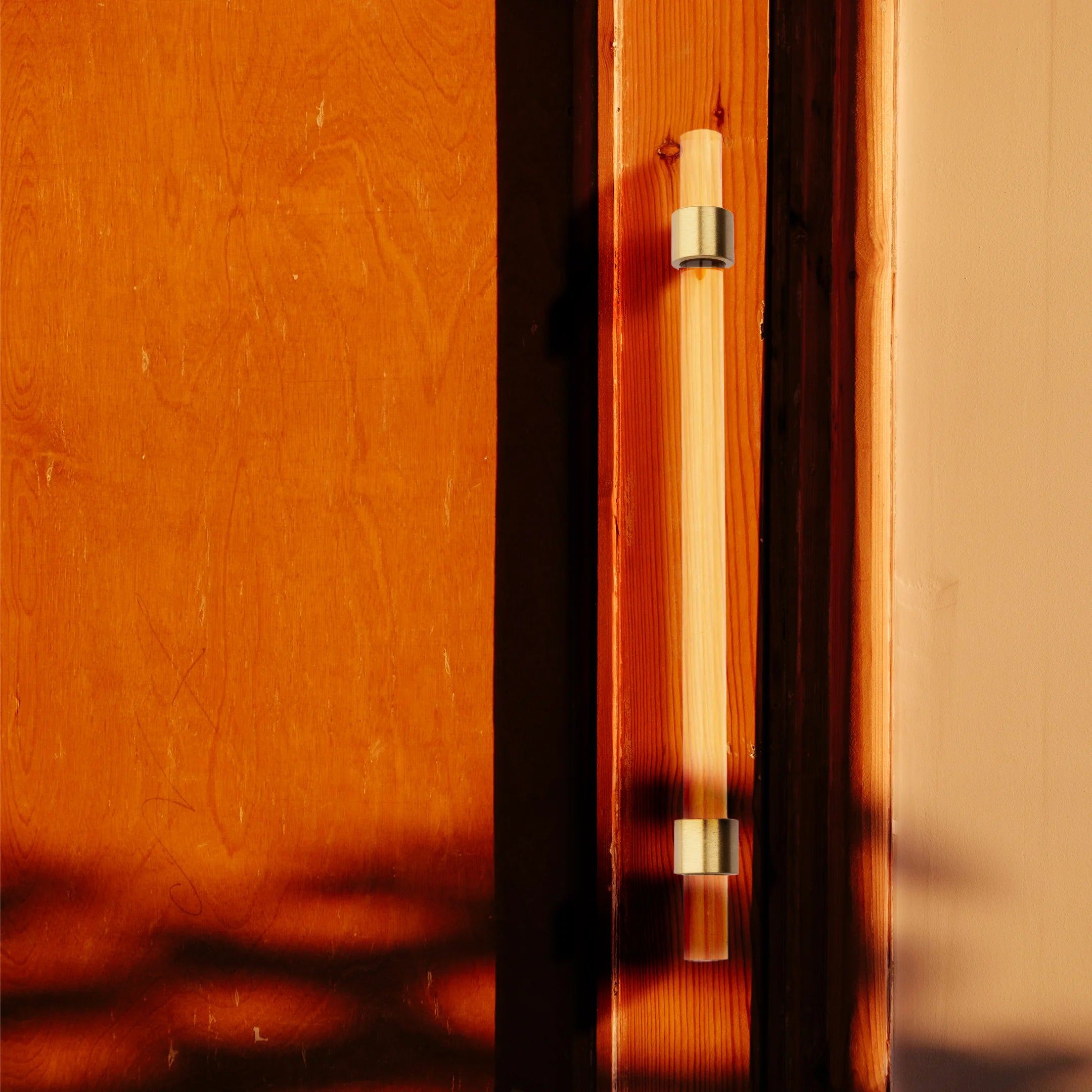 Petra I handle A-0007, clear acrylic & brushed brass, L220mm CC160mm, for wardrobes & cabinets by Mantara