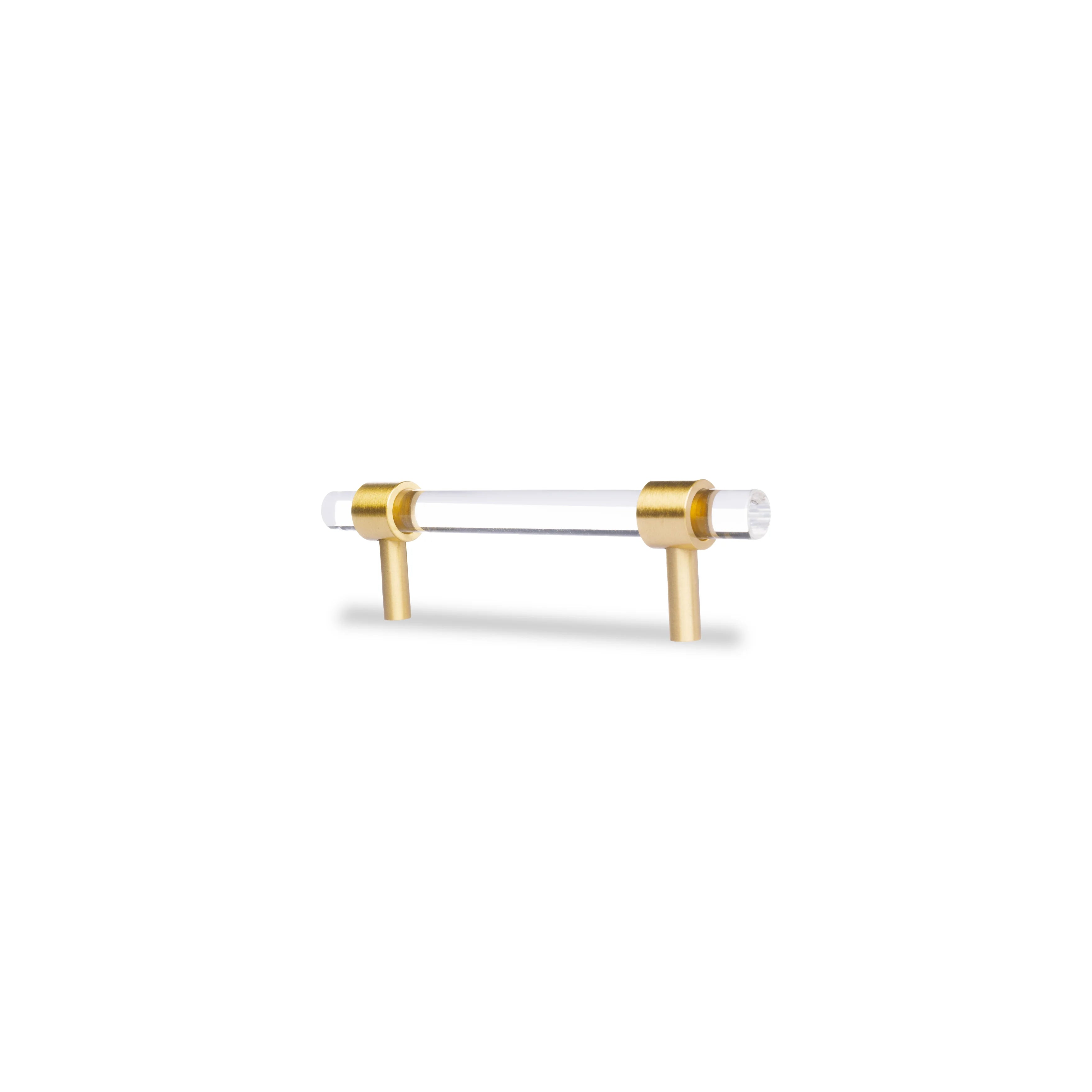 A sleek T-bar handle, Petra II made of clear acrylic with brushed brass supports in transparent white finish, model A-0008 by Mantara, A-0008.