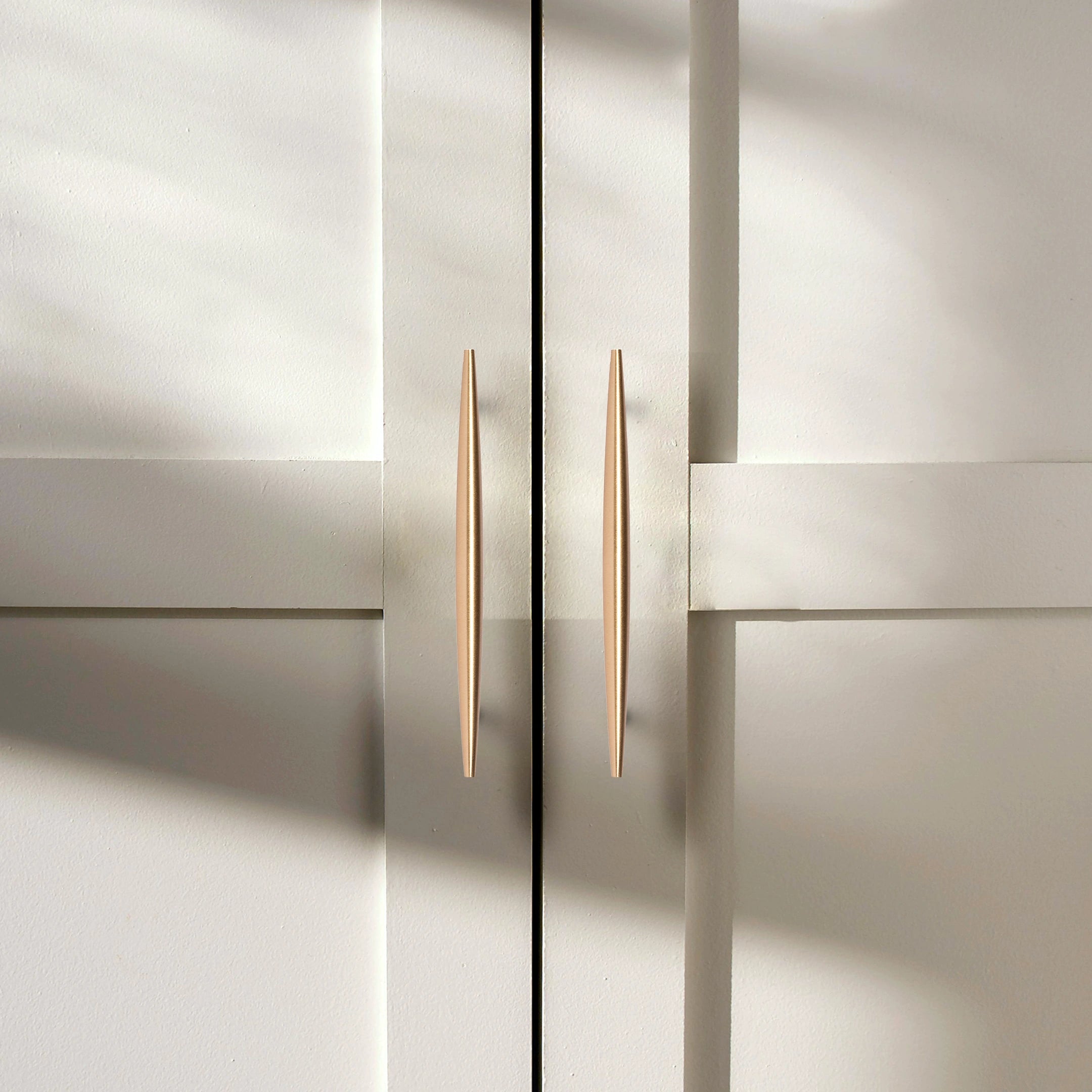 Mantara Gilded T Bar Handle B-0072 is a modern brass handle in brushed gold, ideal for wardrobes, doors, and kitchens.