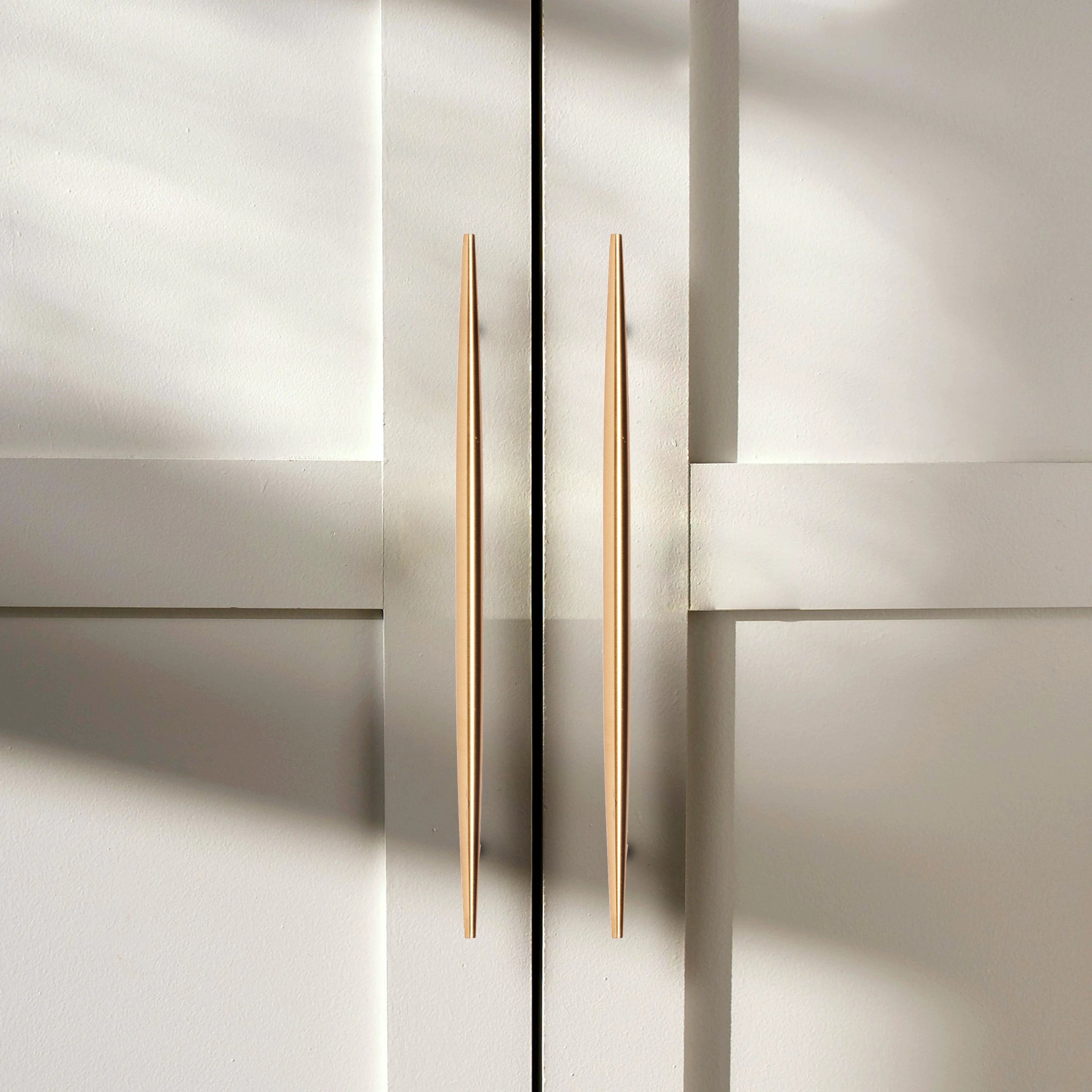 Mantara Gilded T Bar Handle B-0072 is a modern brass handle in brushed gold, ideal for wardrobes, doors, and kitchens.
