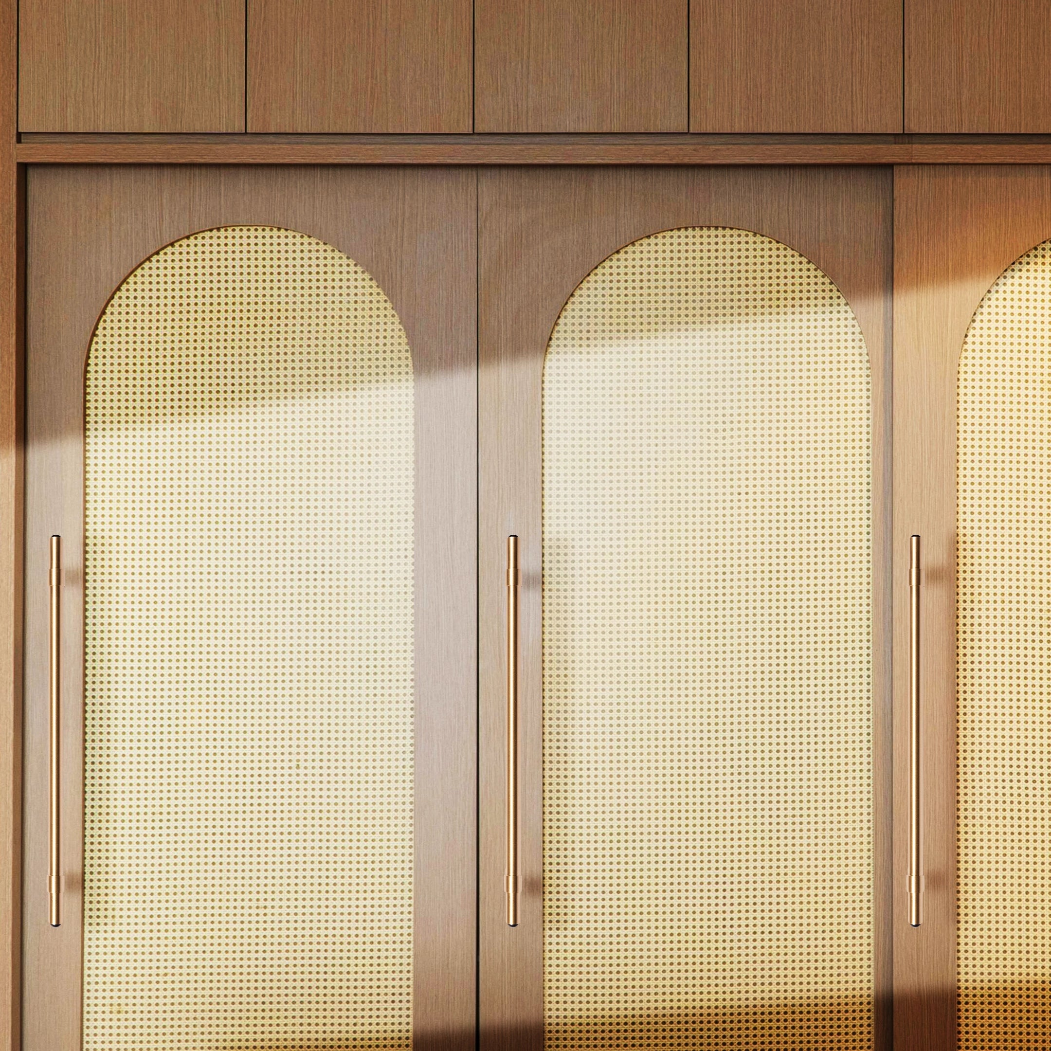 The Zania Handle by Mantara B-0111 is a modern brushed brass handle in gold, ideal for kitchens, dressers, and cabinets.