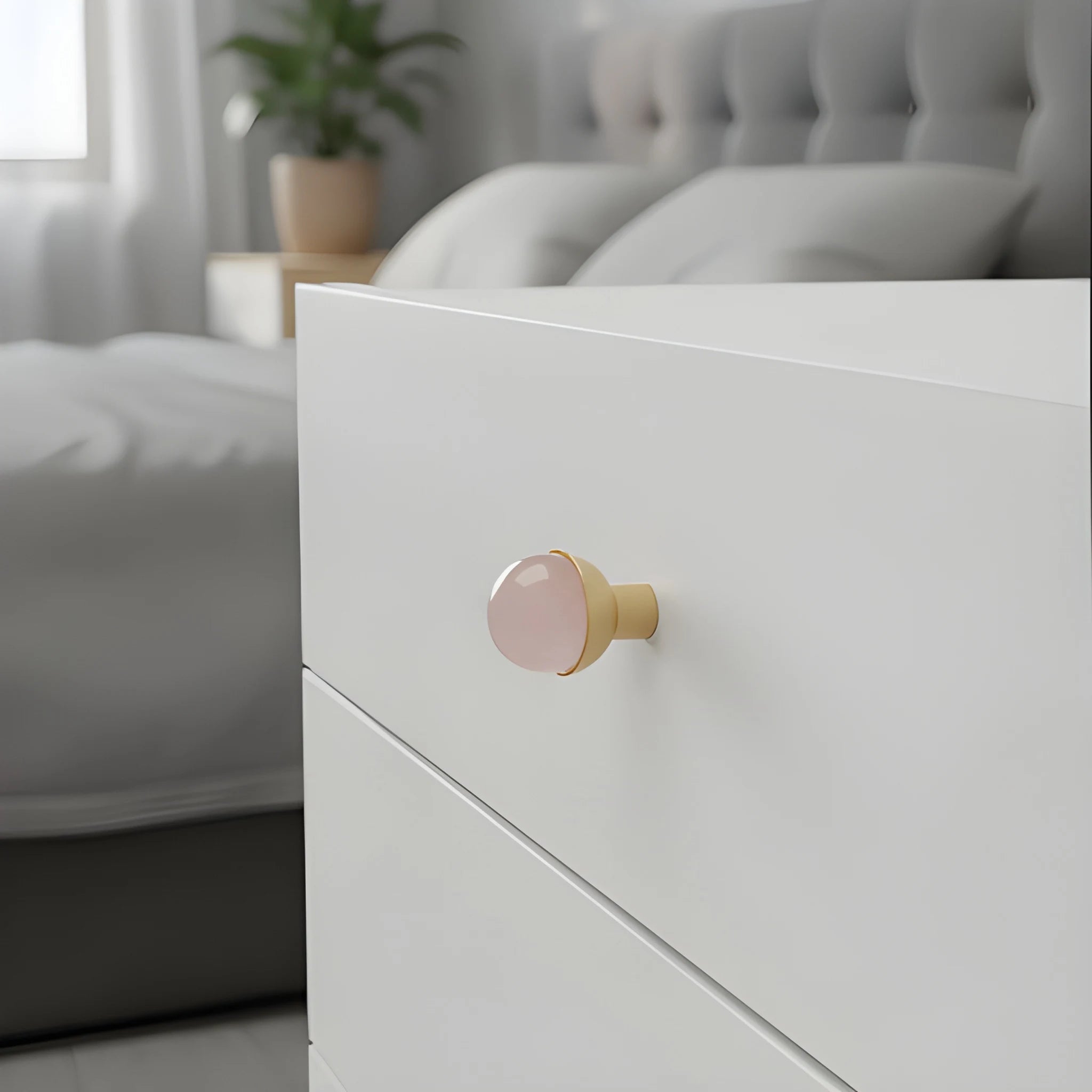 The Mantara C-0006 is a modern crystal + brass knob in pink, ideal for drawers and cabinets.