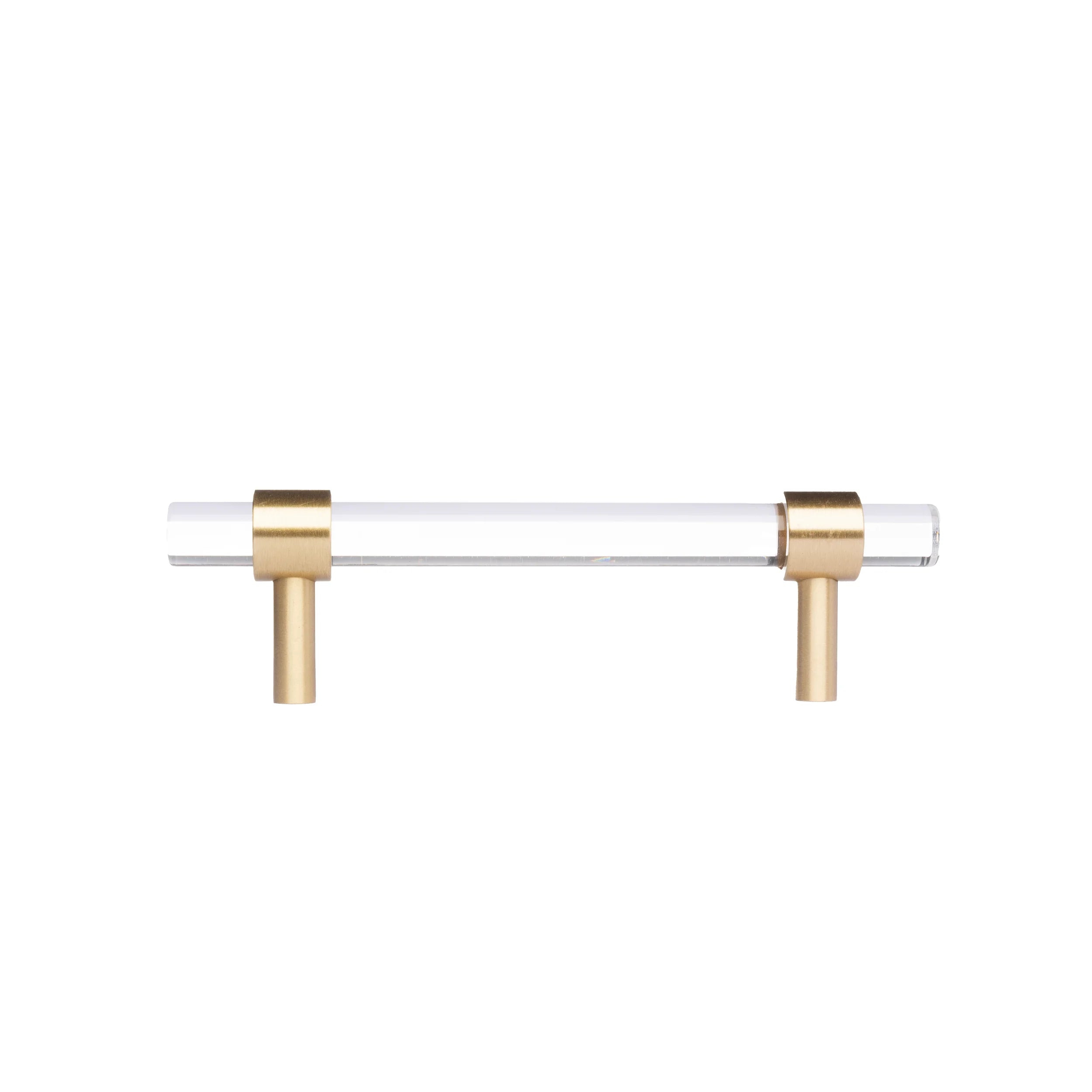 A sleek T-bar handle, Petra II made of clear acrylic with brushed brass supports in transparent white finish, model A-0008 by Mantara, A-0008.