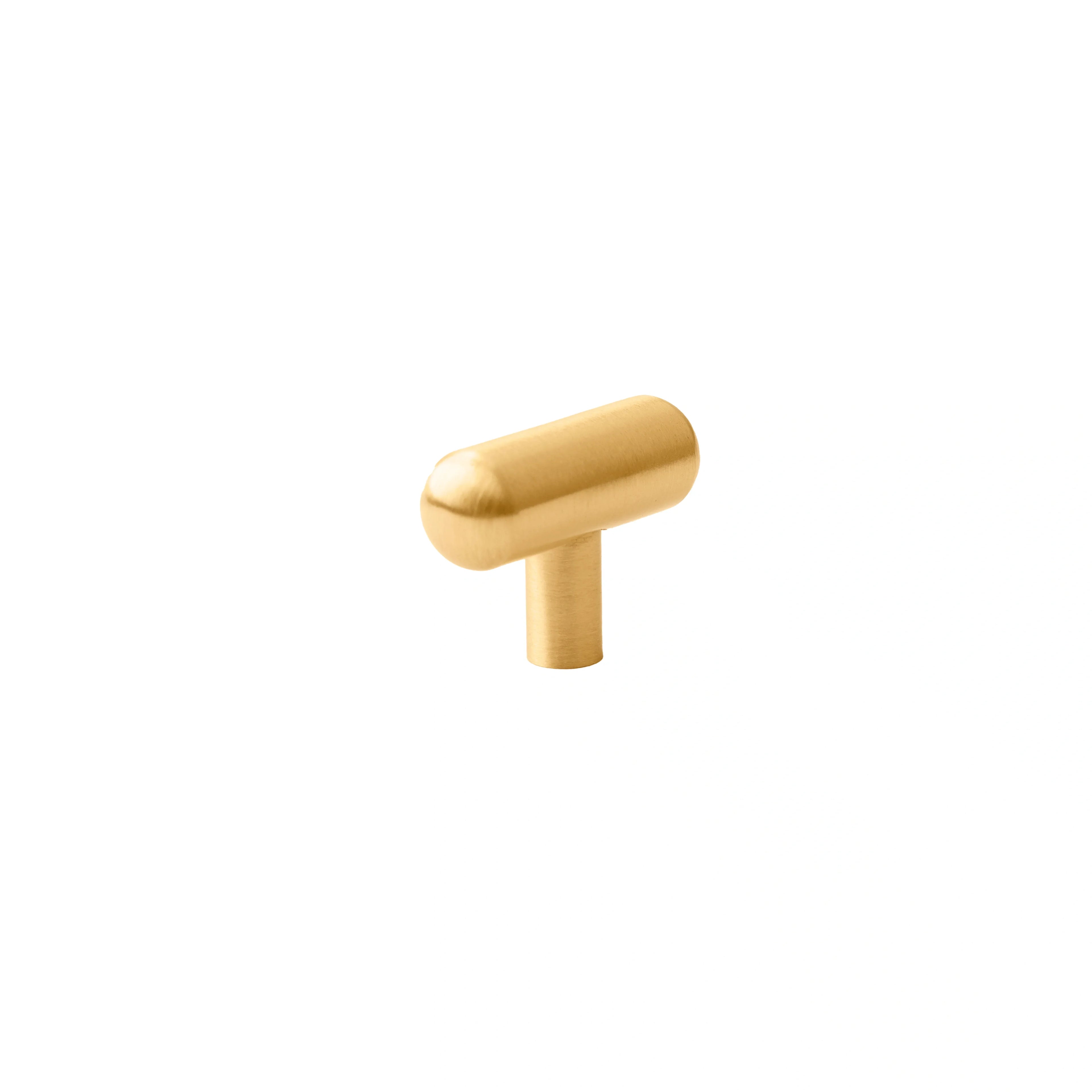 Mantara Pantheon Handle B-0053 is a modern matte brass handle in gold, ideal for kitchens, wardrobes, and cabinets.