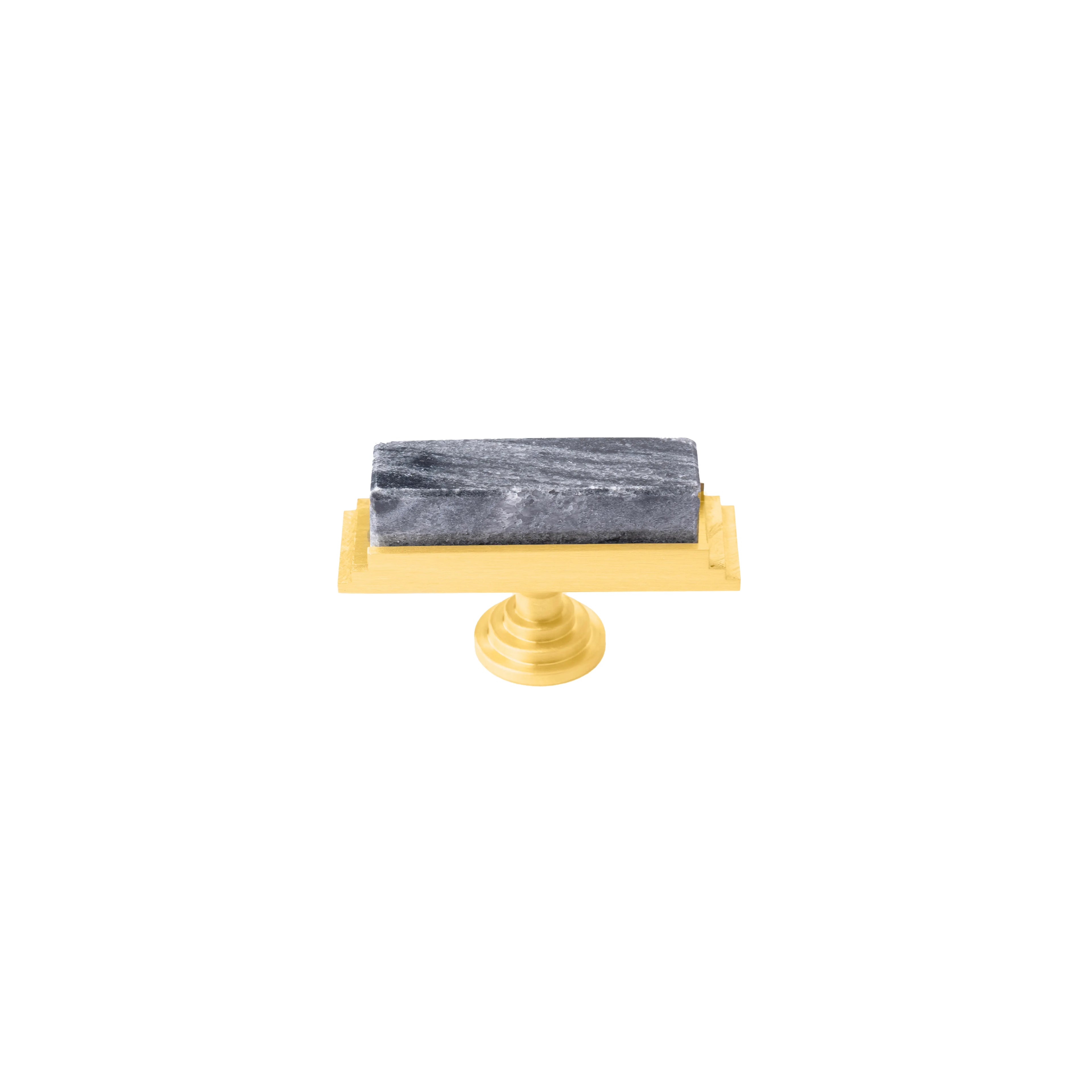 The Mantara M-0010 Fuji Handle is a modern marble and brass handle in grey, ideal for kitchens, cabinets, and bathrooms.
