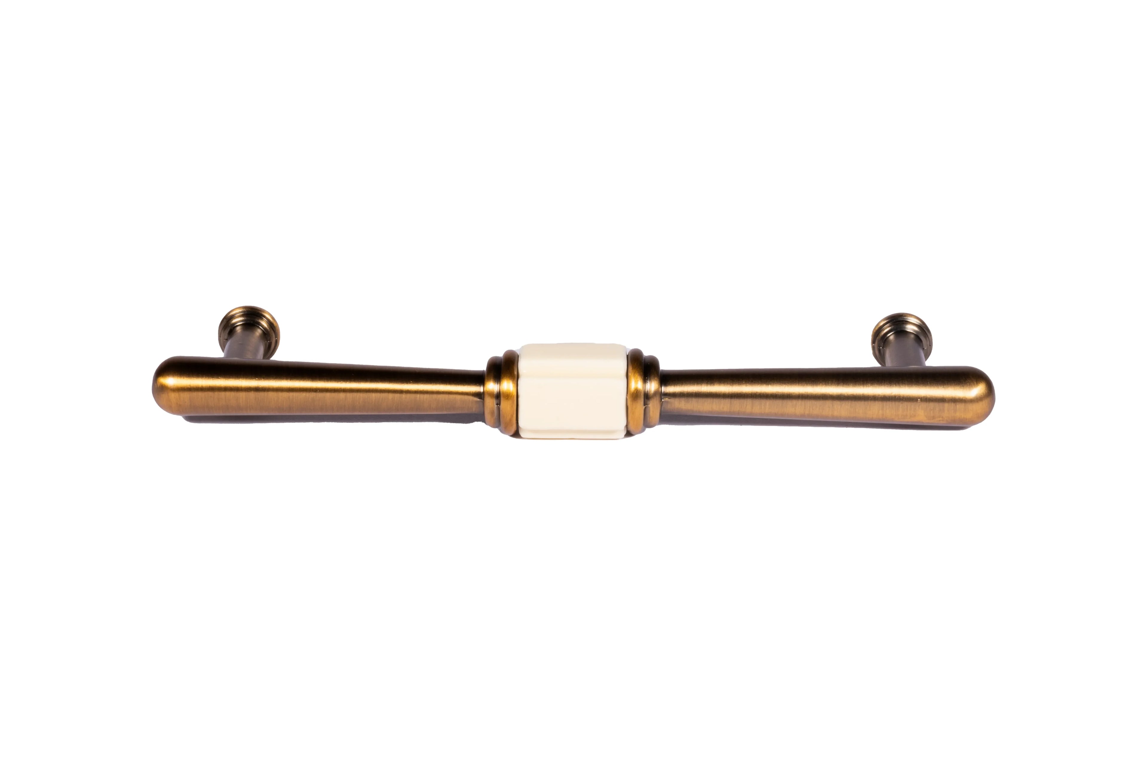Mantara Clara Handle Z-0036 is a modern zinc alloy handle in antique gold finish, ideal for kitchen and dresser drawers.
