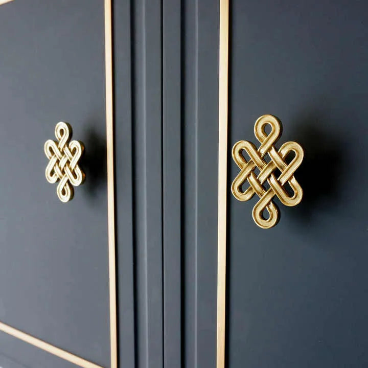 The Lattice Hook by Mantara B-0116 is a modern brass wall hook in gold with a brushed finish, ideal for kitchens and bedrooms.