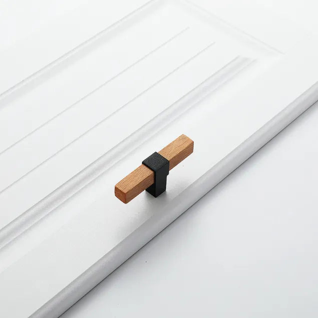 Mantara Lorien Handle W-0028 is a modern zinc and beech wood Tbar in black ideal for kitchen and dresser drawers.