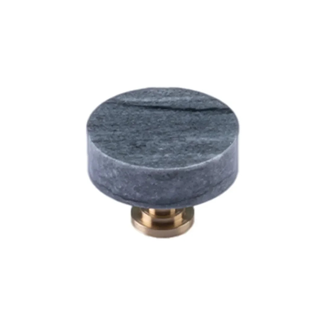 The Mantara M-0001 Theo Knob is a modern marble and brass knob in Grey, ideal for doors, drawers, and cabinets.