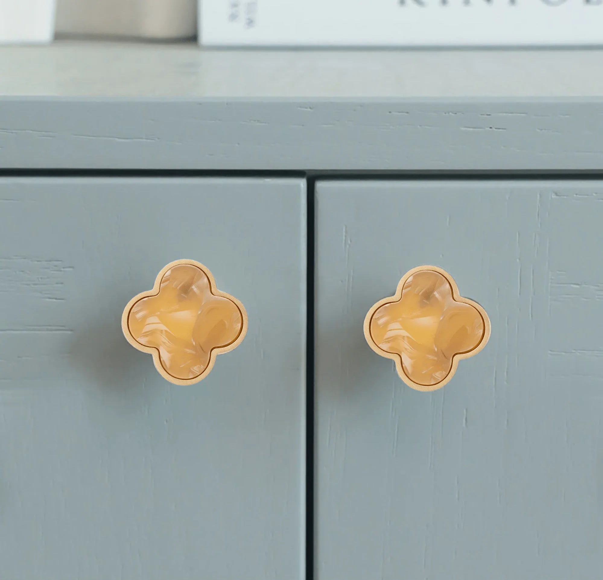 Acrylic and brass round drawer knob in yellow snow finish by Mantara for cabinets, wardrobes and kitchen drawers. Alhambra knob A-0006