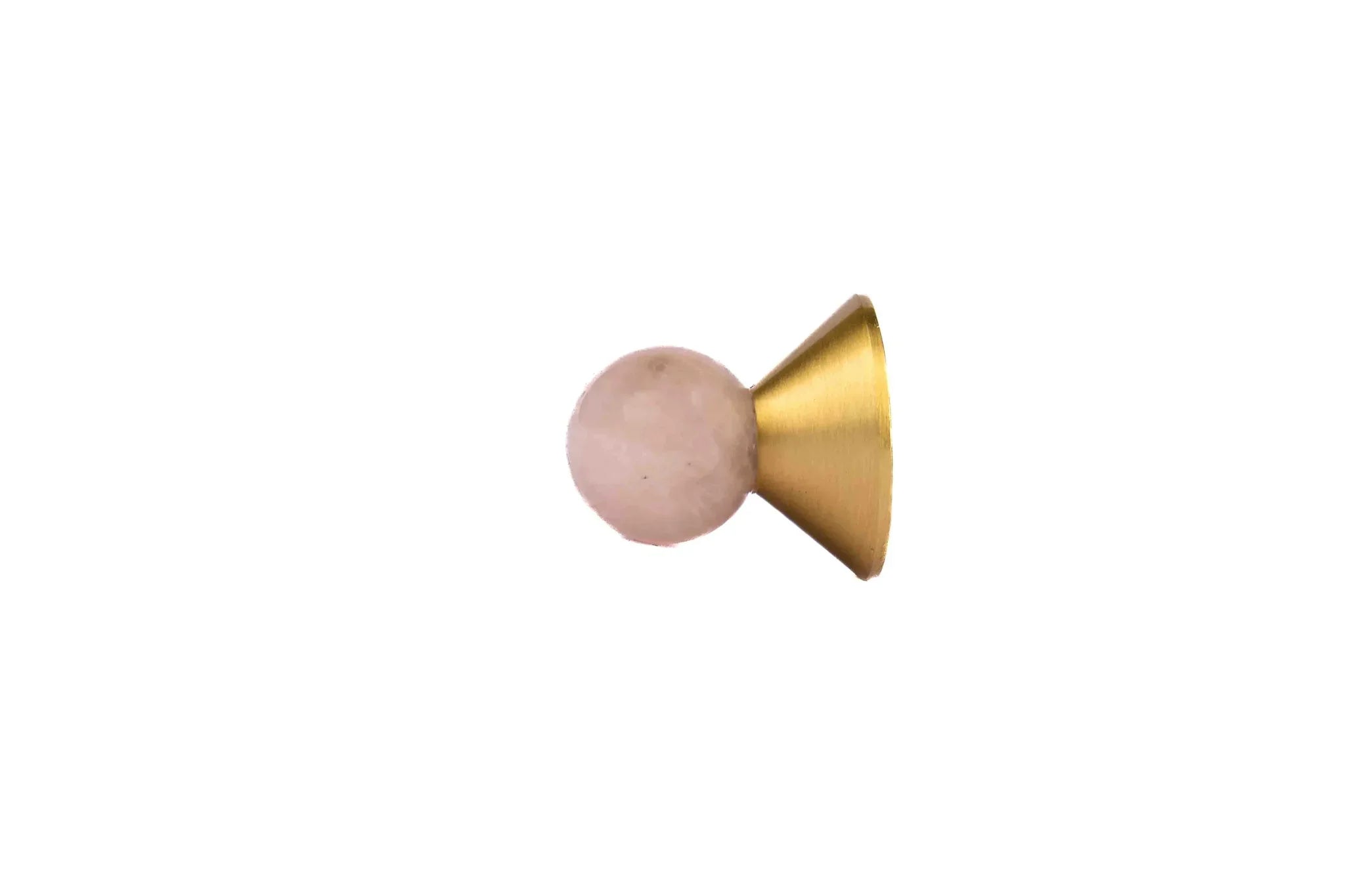 A solid brass round cabinet knob in a brushed gold finish by Mantara, model Astral Knob with B-0002.