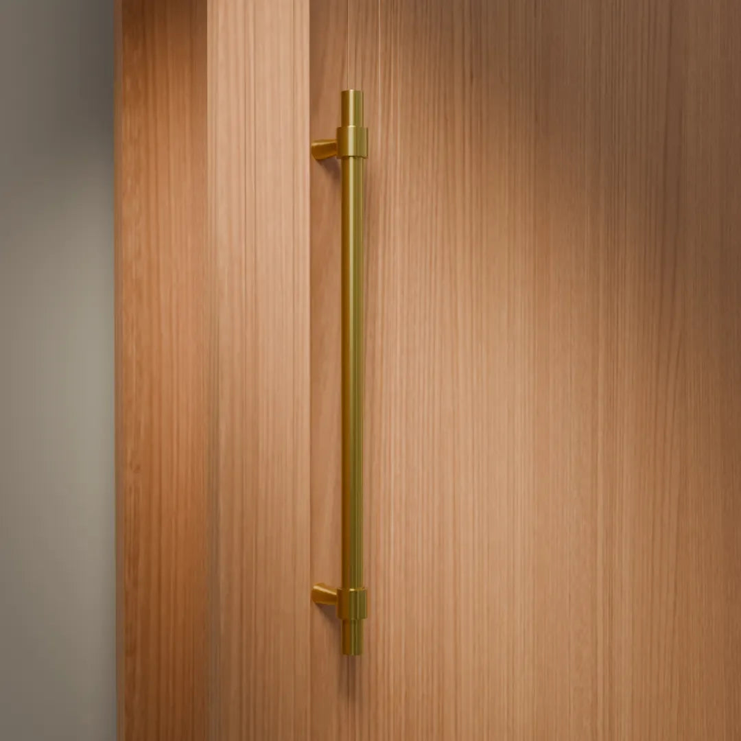 Mantara Seraphine Handle B-0054 is a modern brushed brass handle in gold, ideal for wardrobes, almirahs, and kitchens.
