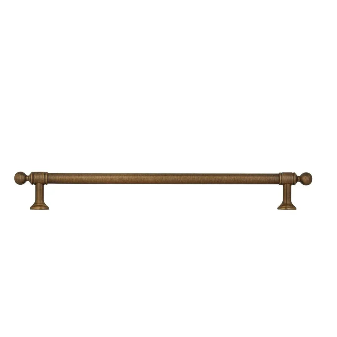 The Mantara B-0127 Caelum Handle is a modern brass handle in bronze and gold, perfect for kitchen drawers, cabinets, and furniture.