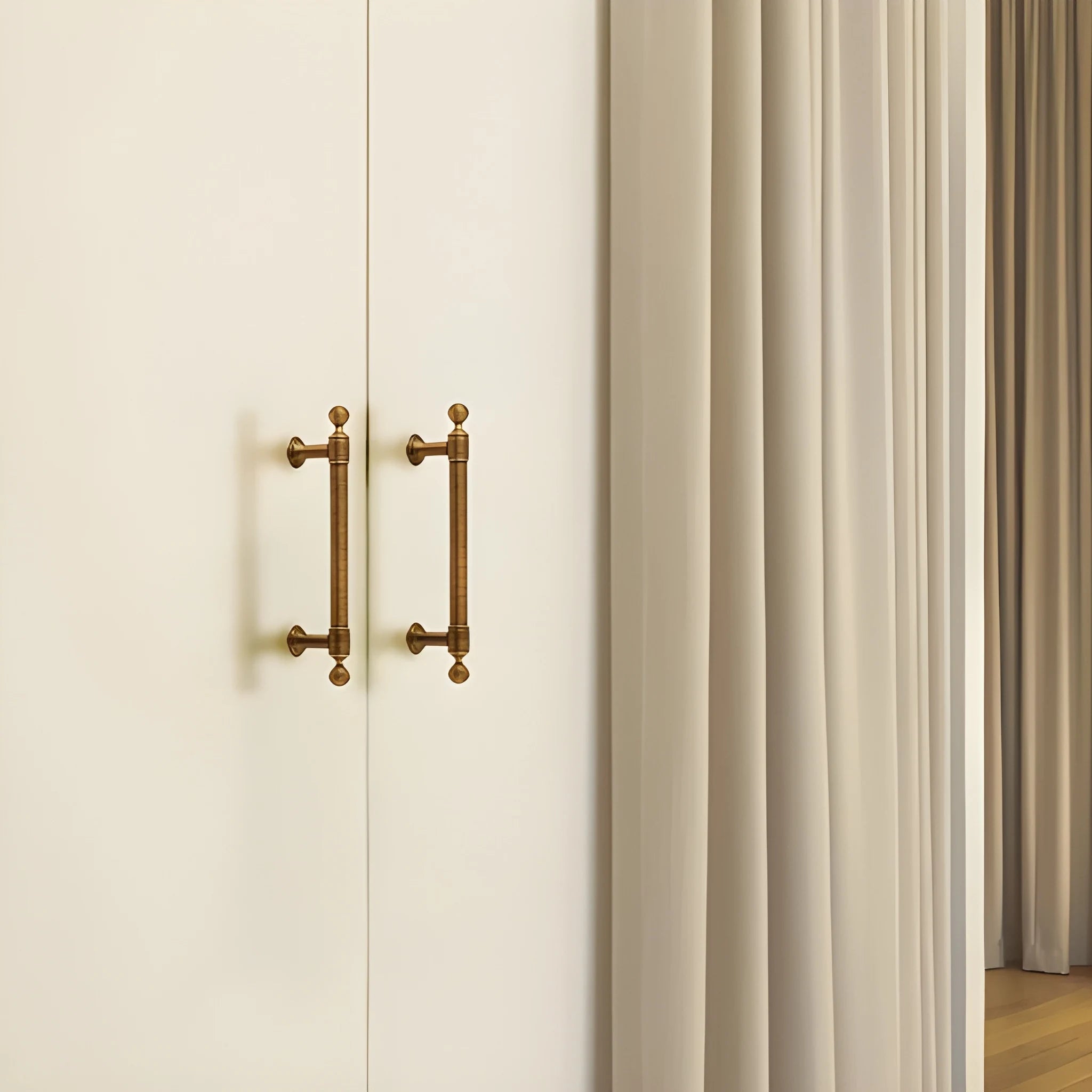 The Mantara B-0127 Caelum Handle is a modern brass handle in bronze and gold, perfect for kitchen drawers, cabinets, and furniture.