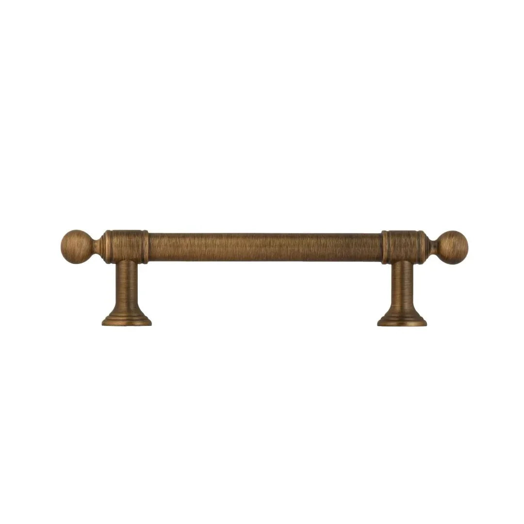 The Mantara B-0127 Caelum Handle is a modern brass handle in bronze and gold, perfect for kitchen drawers, cabinets, and furniture.