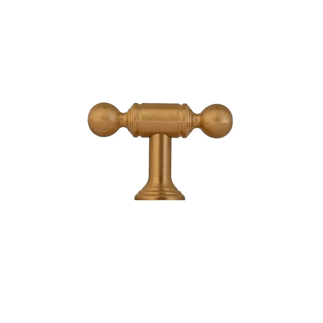 The Mantara B-0127 Caelum Handle is a modern brass handle in bronze and gold, perfect for kitchen drawers, cabinets, and furniture.
