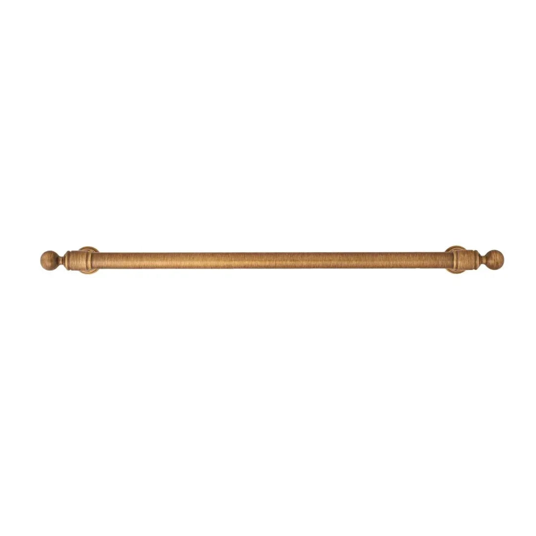 The Mantara B-0127 Caelum Handle is a modern brass handle in bronze and gold, perfect for kitchen drawers, cabinets, and furniture.