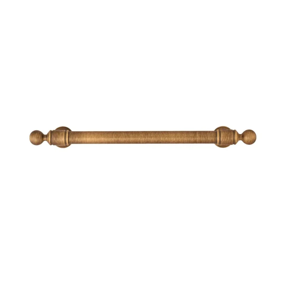 The Mantara B-0127 Caelum Handle is a modern brass handle in bronze and gold, perfect for kitchen drawers, cabinets, and furniture.