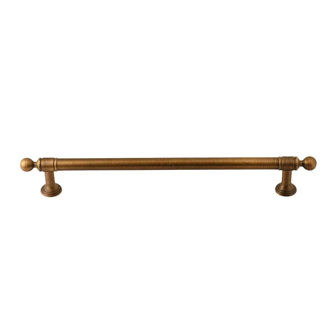 The Mantara B-0127 Caelum Handle is a modern brass handle in bronze and gold, perfect for kitchen drawers, cabinets, and furniture.