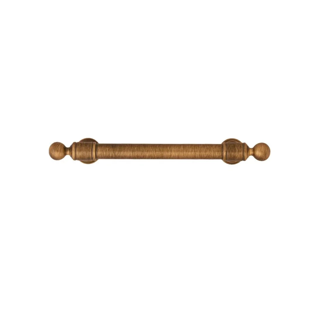 The Mantara B-0127 Caelum Handle is a modern brass handle in bronze and gold, perfect for kitchen drawers, cabinets, and furniture.
