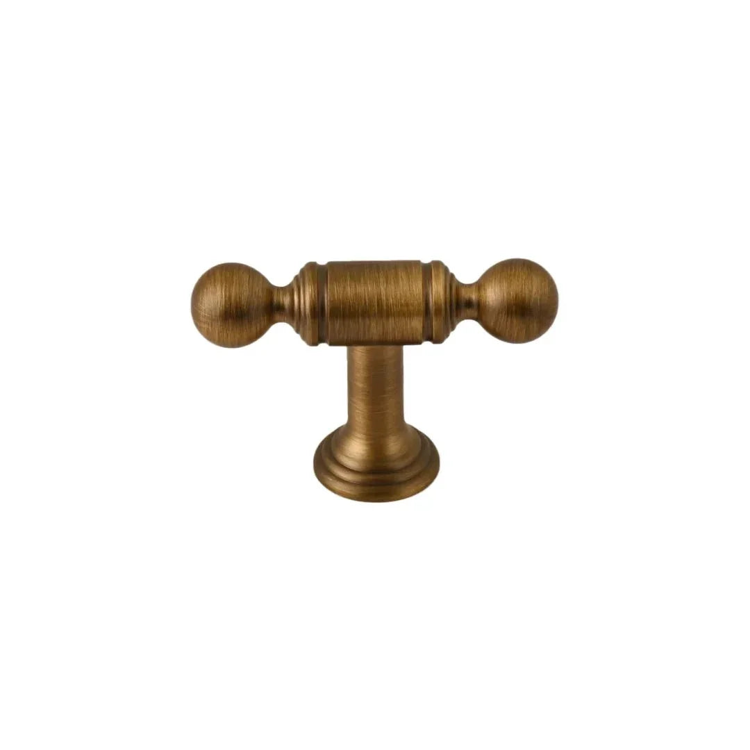 The Mantara B-0127 Caelum Handle is a modern brass handle in bronze and gold, perfect for kitchen drawers, cabinets, and furniture.