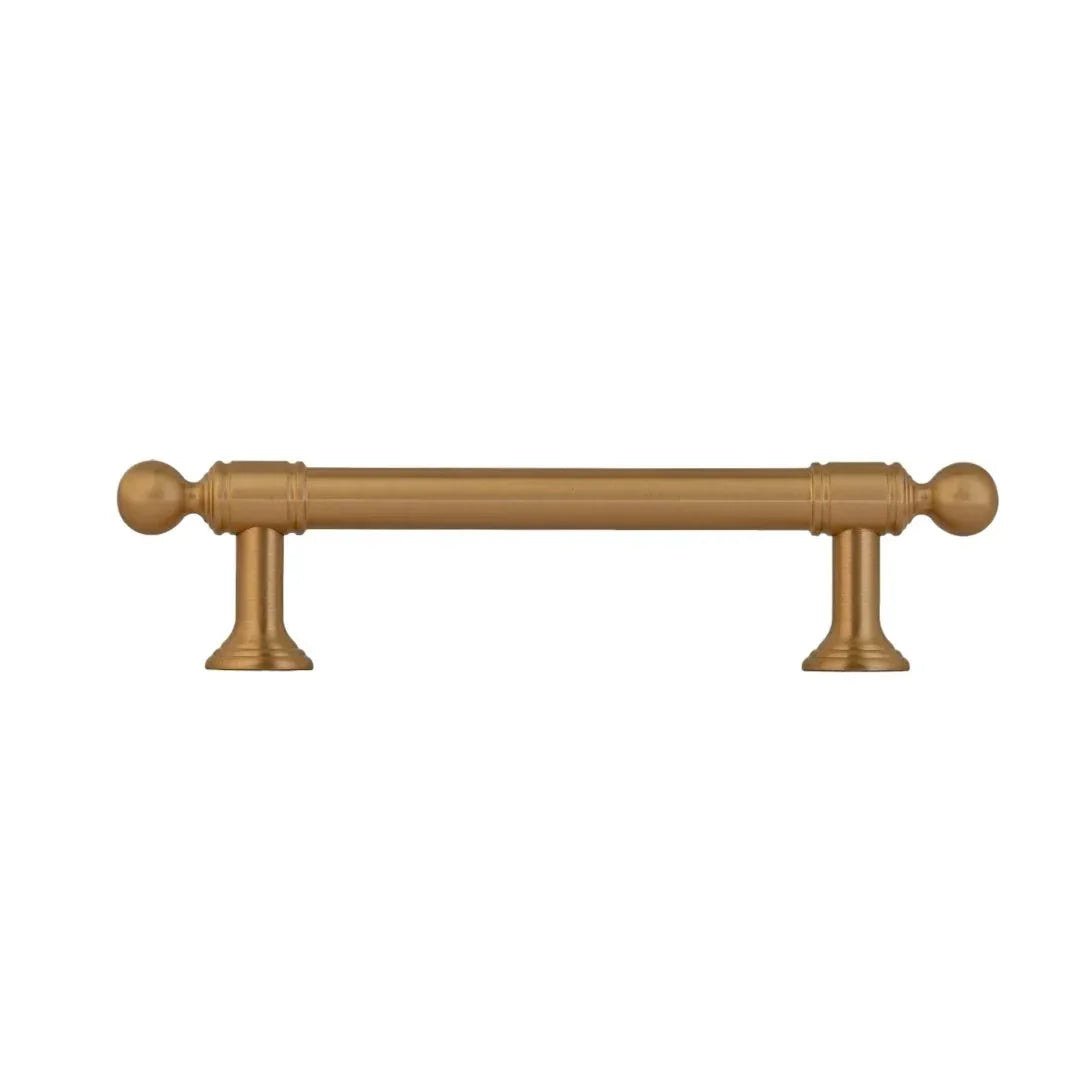 The Mantara B-0127 Caelum Handle is a modern brass handle in bronze and gold, perfect for kitchen drawers, cabinets, and furniture.