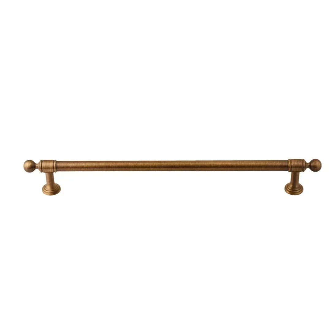 The Mantara B-0127 Caelum Handle is a modern brass handle in bronze and gold, perfect for kitchen drawers, cabinets, and furniture.