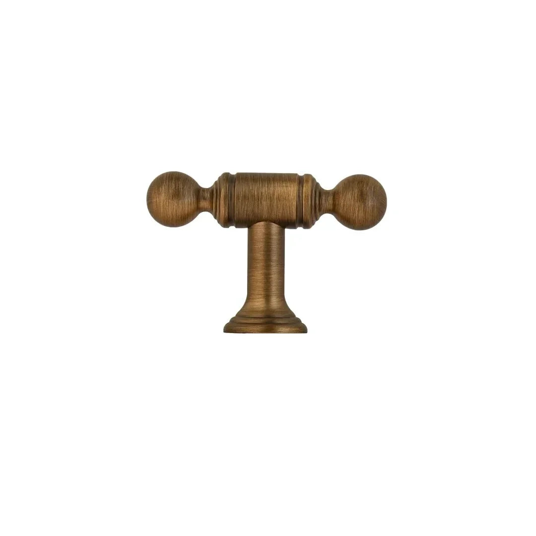 The Mantara B-0127 Caelum Handle is a modern brass handle in bronze and gold, perfect for kitchen drawers, cabinets, and furniture.