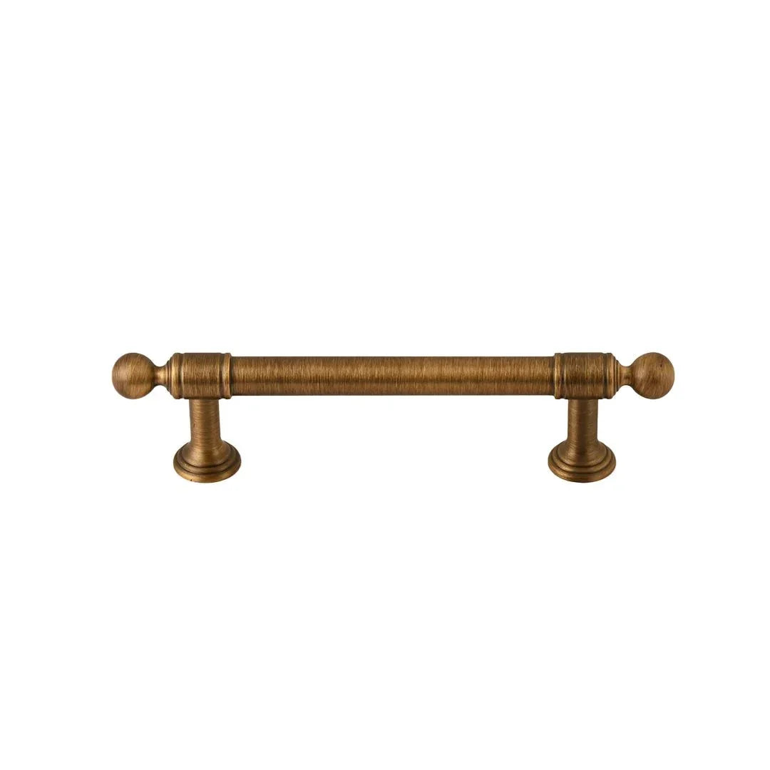 The Mantara B-0127 Caelum Handle is a modern brass handle in bronze and gold, perfect for kitchen drawers, cabinets, and furniture.