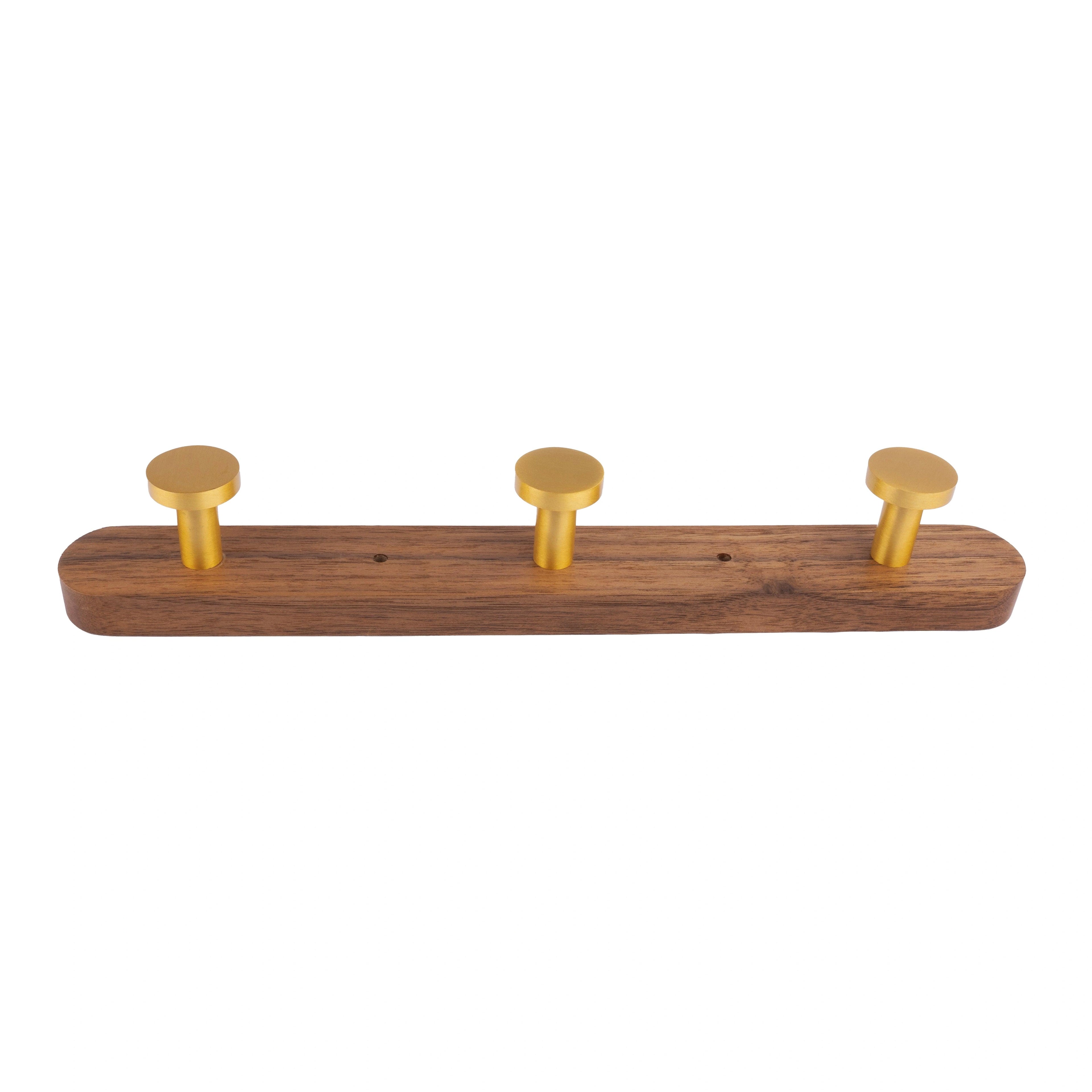 Mantara Calista Hook W-0011 is a modern walnut wood & brass wall hook in gold with brushed finish, ideal for homes & hotels.