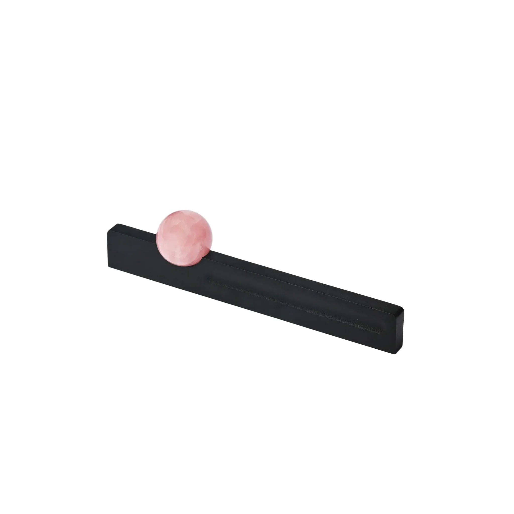 The Mantara C-0027 Calyx Handle is a modern crystal handle in black and pink, ideal for cabinets, wardrobes, and drawers.