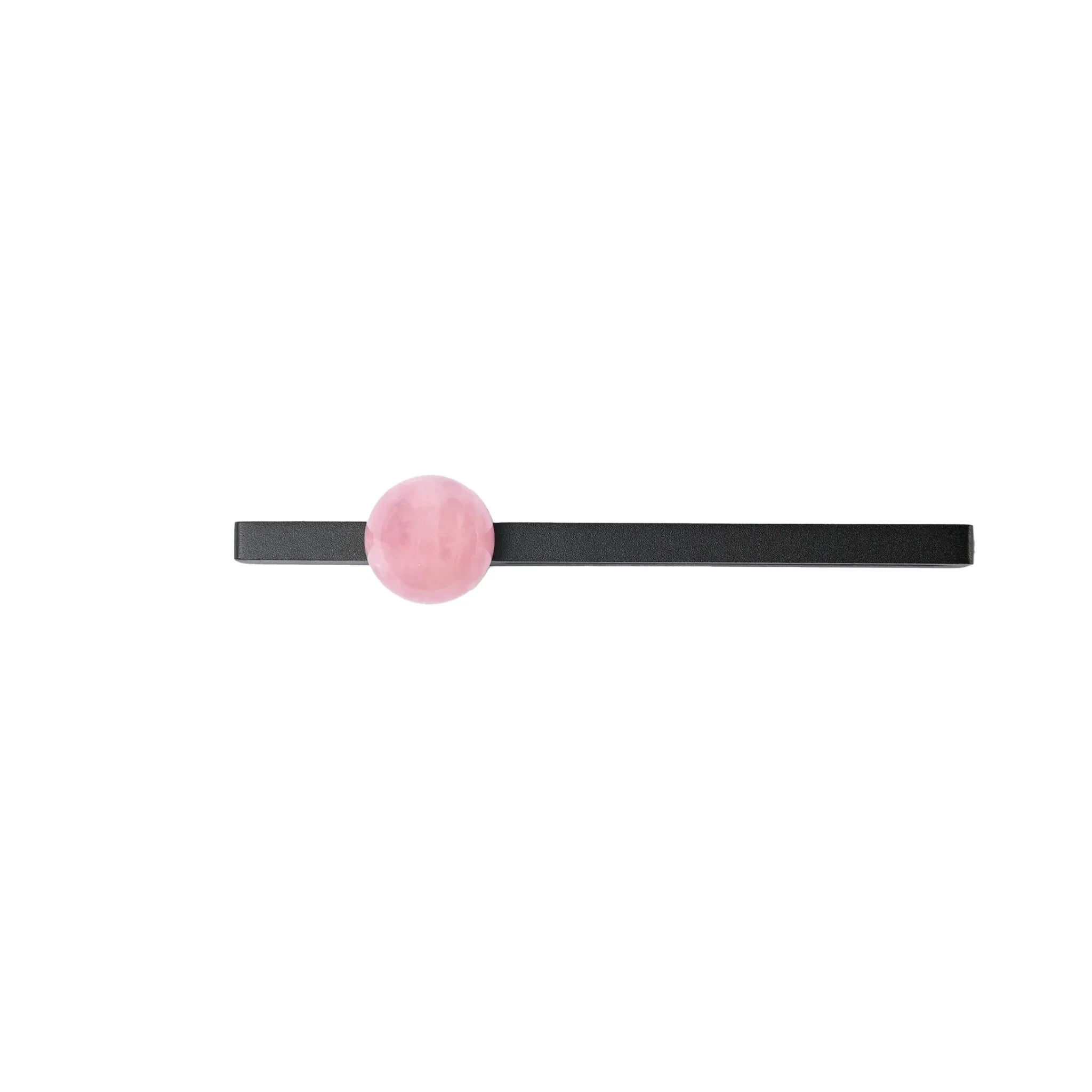 The Mantara C-0027 Calyx Handle is a modern crystal handle in black and pink, ideal for cabinets, wardrobes, and drawers.