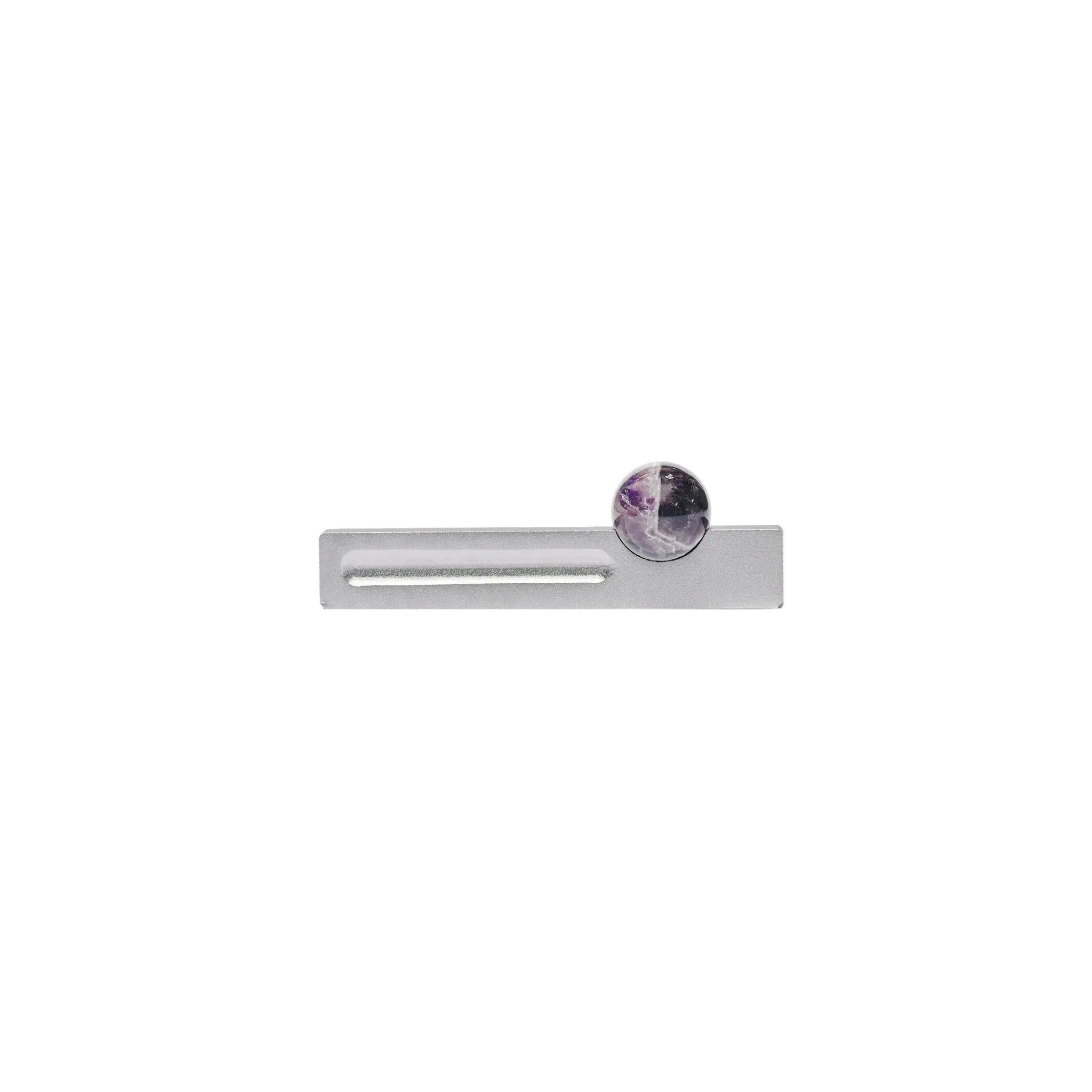 The Mantara C-0027 Calyx Handle is a modern crystal handle in silver and purple, ideal for cabinets, wardrobes, and drawers.