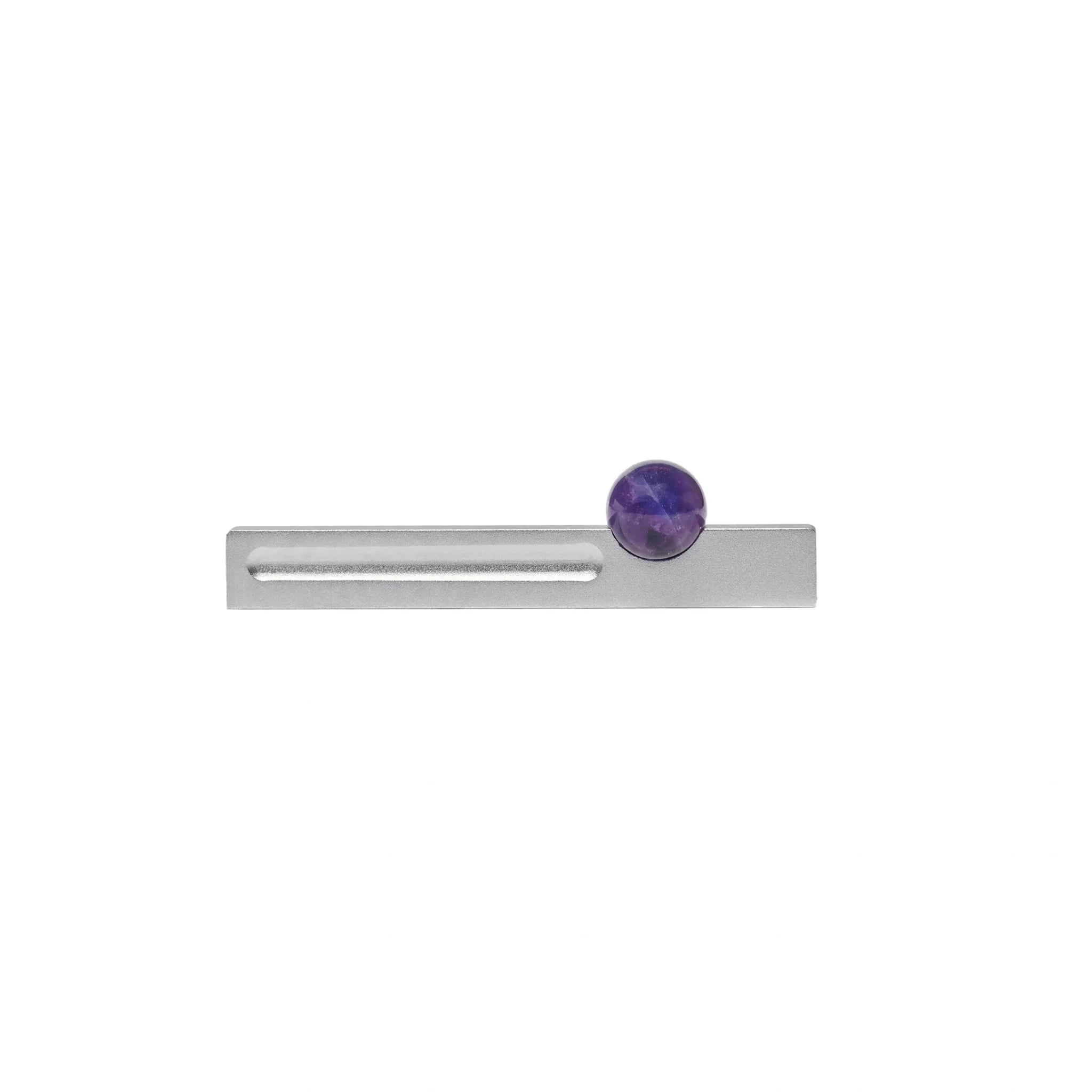The Mantara C-0027 Calyx Handle is a modern crystal handle in silver and purple, ideal for cabinets, wardrobes, and drawers.