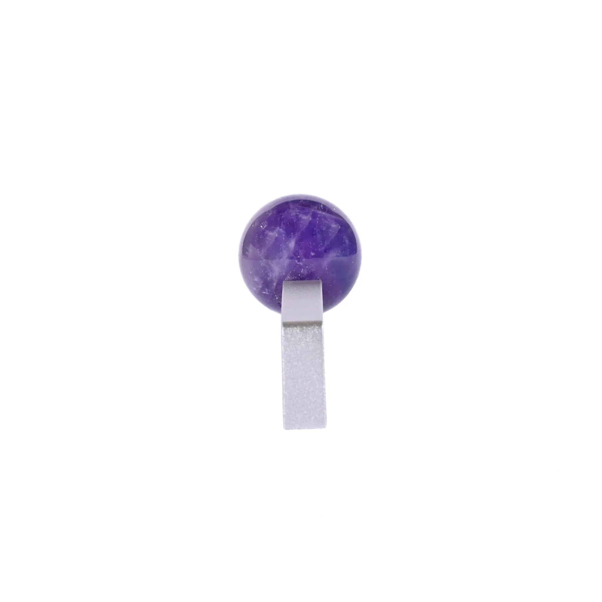 The Mantara C-0027 Calyx Handle is a modern crystal handle in silver and purple, ideal for cabinets, wardrobes, and drawers.