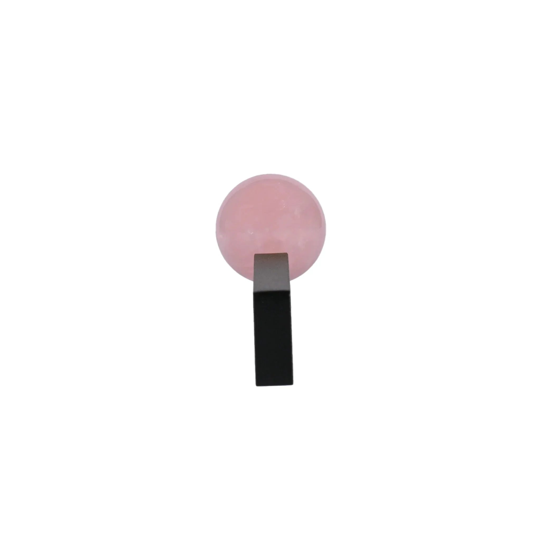 The Mantara C-0027 Calyx Handle is a modern crystal handle in black and pink, ideal for cabinets, wardrobes, and drawers.