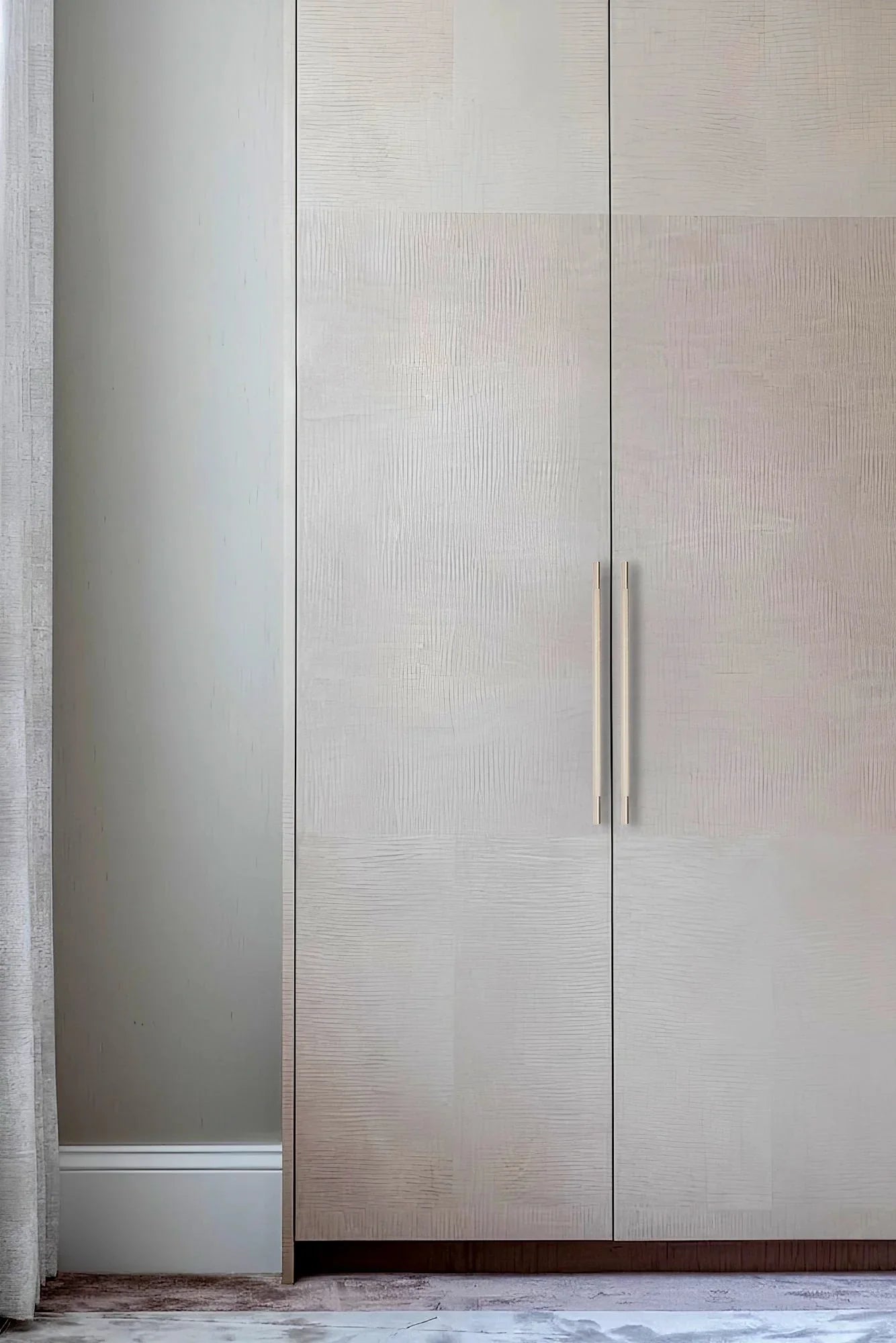 The Mantara AL-0018 Caro Handle is a modern aluminum alloy handle in gold with a brushed finish, ideal for drawers and cabinets.