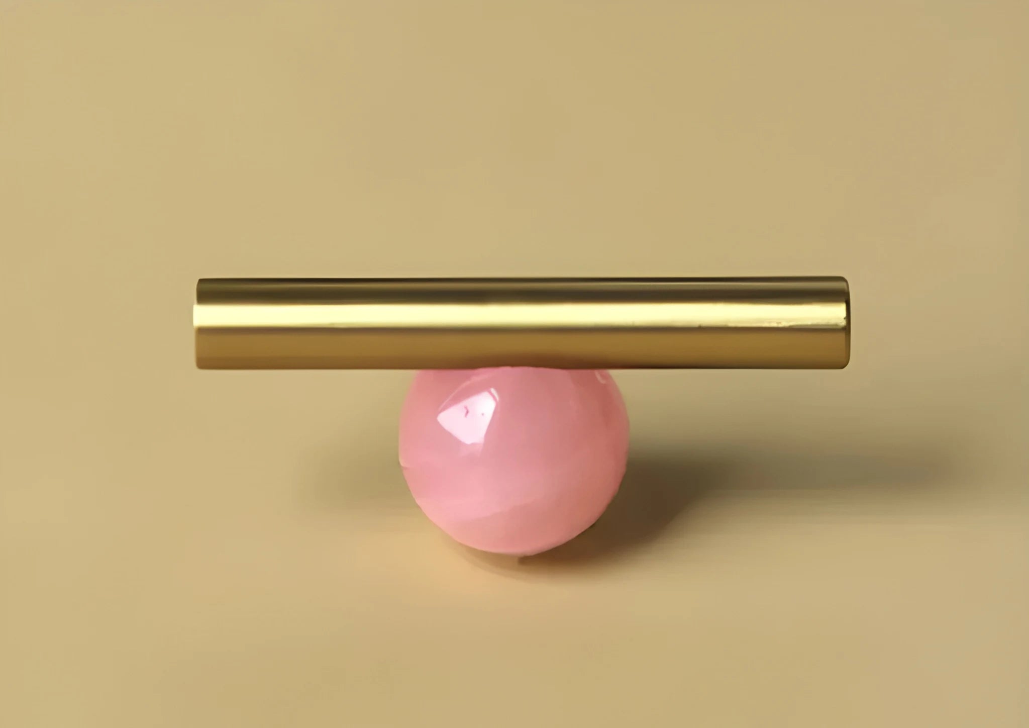 The Mantara C-0020 Chroma T-Bar is a modern crystal and brass knob in pink, ideal for drawers and cabinets.