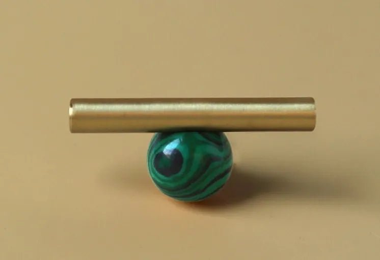 The Mantara C-0020 Chroma T-Bar is a modern crystal and brass knob in green, ideal for drawers and cabinets.