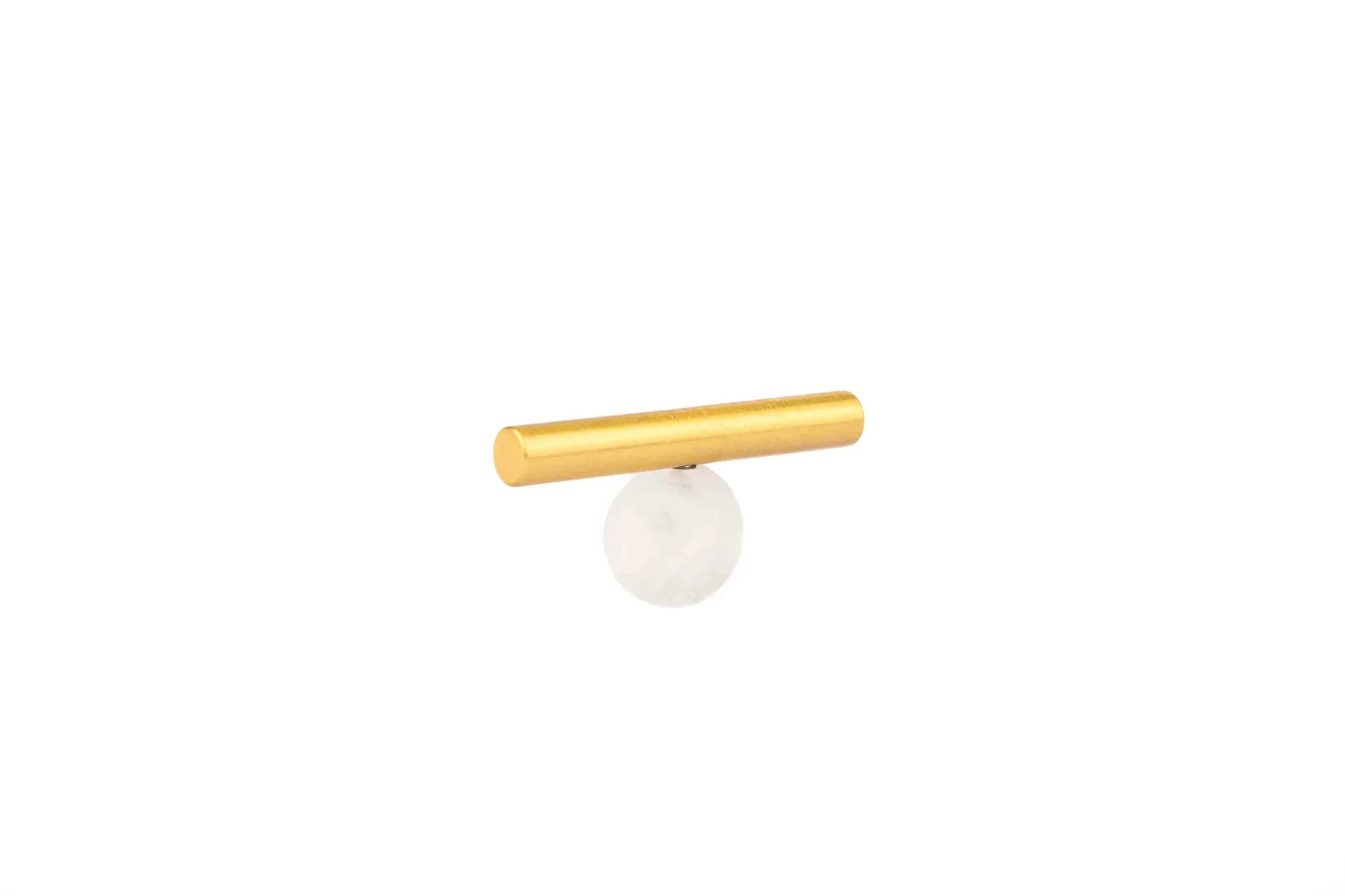 The Mantara C-0020 Chroma T-Bar is a modern crystal and brass knob in white, ideal for drawers and cabinets.