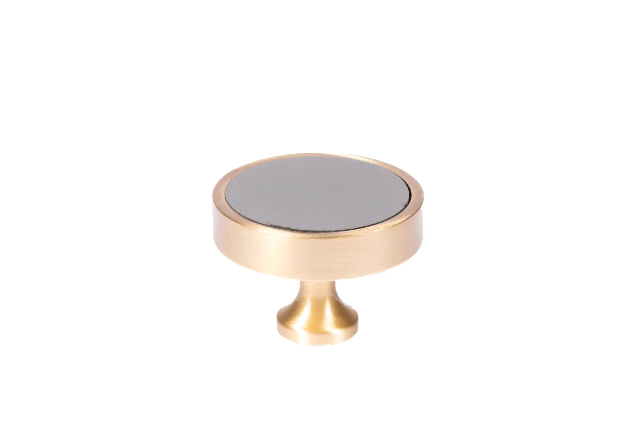 The Mantara L-0014 is a modern leather + brass knob in grey, perfect for kitchen drawers and dressers.