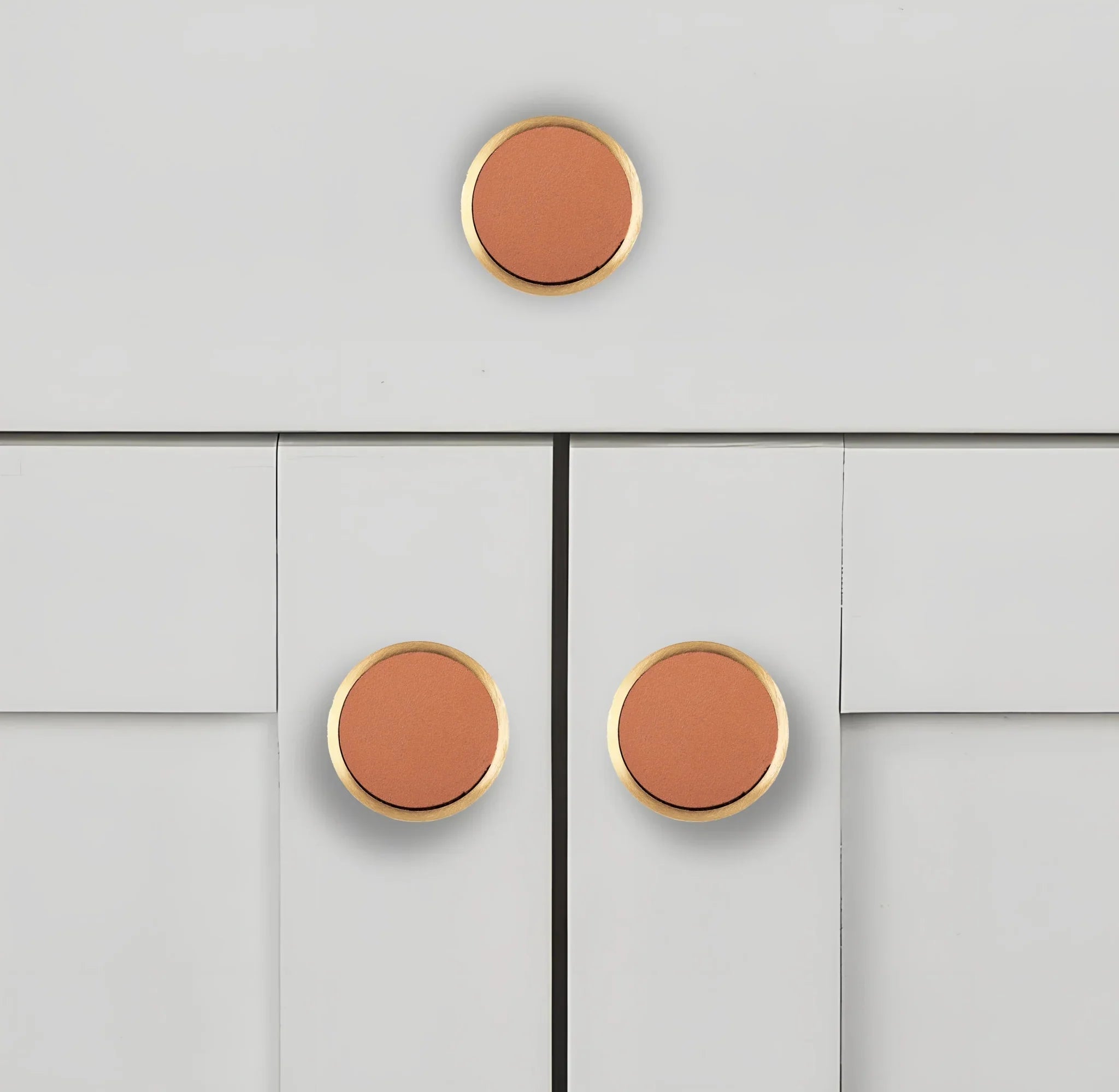 The Mantara L-0014 is a modern leather + brass knob in brown, perfect for kitchen drawers and dressers.