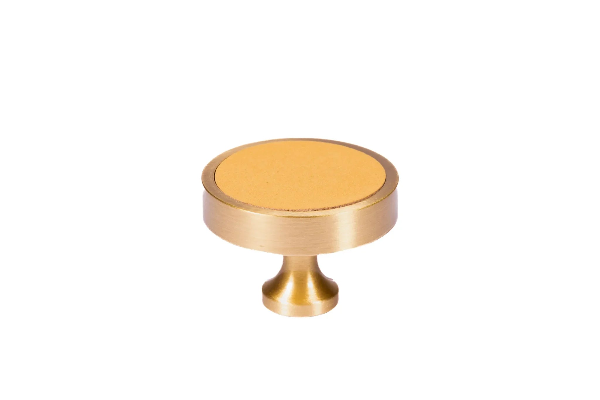 The Mantara L-0014 is a modern leather + brass knob in orange, perfect for kitchen drawers and dressers.